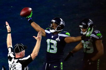GLENDALE, AZ - FEBRUARY 01:  Chris Matthews #13 of the Seattle Seahawks celebrates scoring an 11 yard touchdown late in the second quarter with Doug Baldwin #89 against the New England Patriots during Super Bowl XLIX at University of Phoenix Stadium on Fe