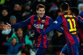 BARCELONA, SPAIN - FEBRUARY 01:  Lionel Messi of FC Barcelona celebrates with his teammate Neymar of FC Barcelona after scoring his team's third goal during the La Liga match between FC Barcelona and Villarreal CF at Camp Nou on February 1, 2015 in Barcel