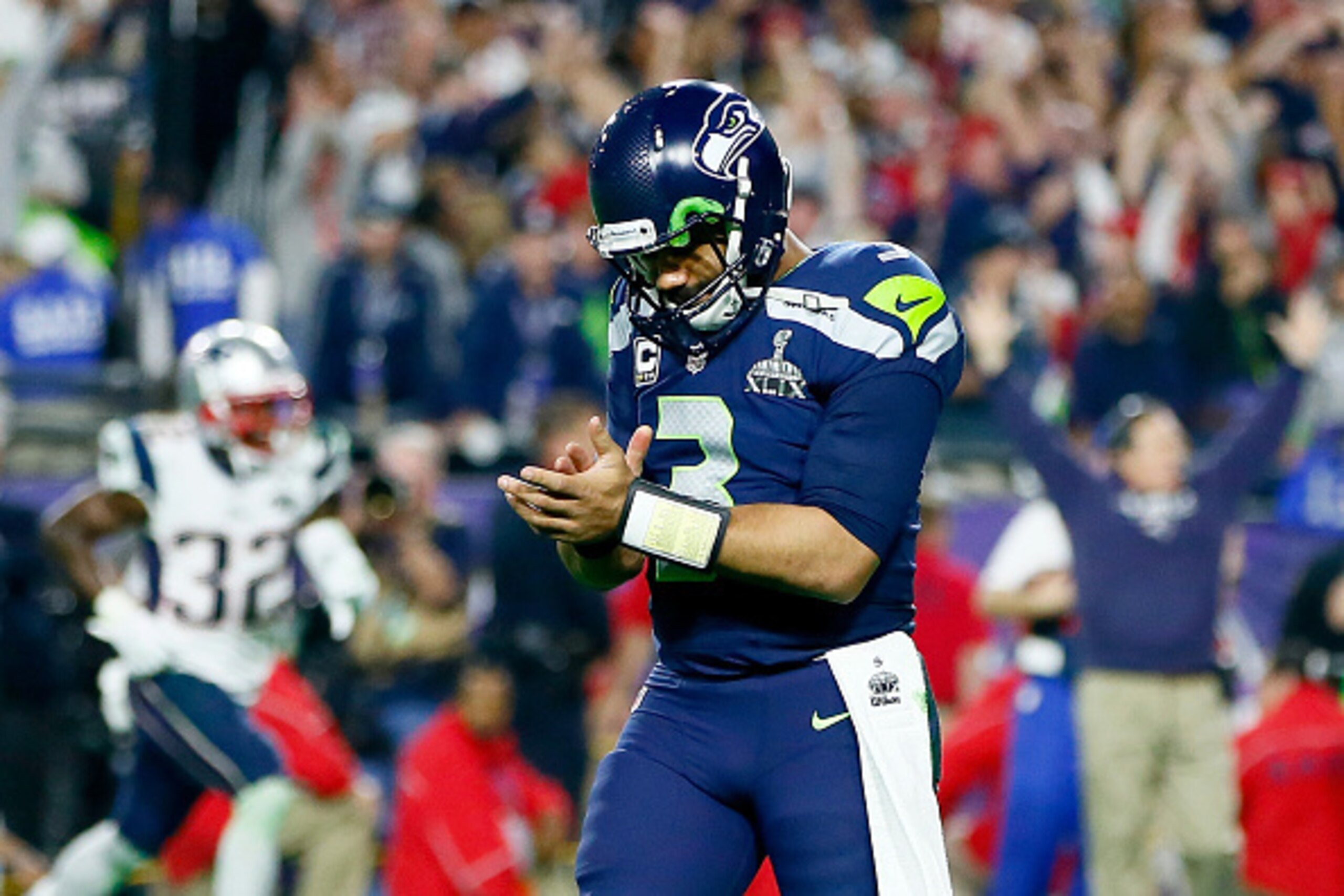 GLENDALE, AZ - FEBRUARY 01:  Russell Wilson #3 of the Seattle Seahawks looks on after his pass is intercepted by Malcolm Butler #21 of the New England Patriots late in the fourth quarter against the New England Patriots during Super Bowl XLIX at Universit