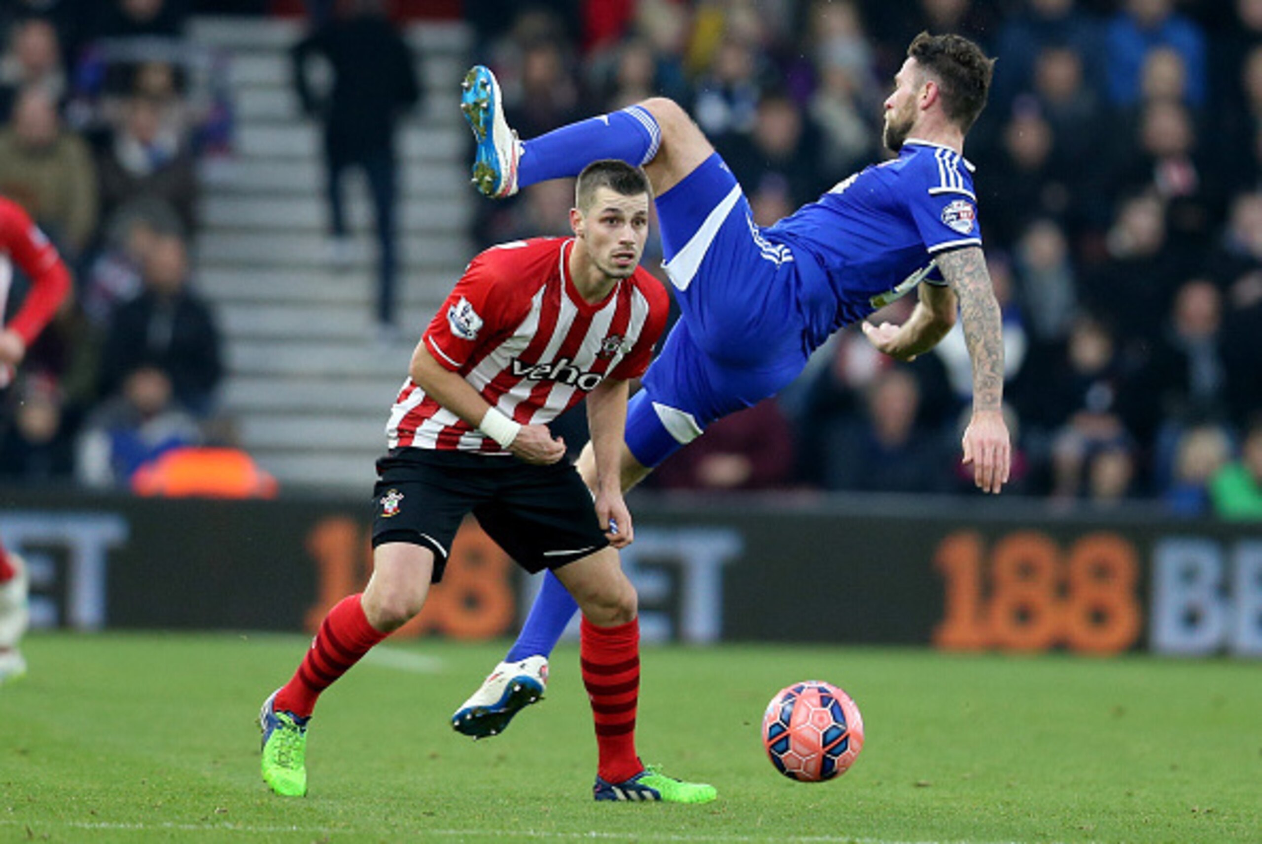 SOUTHAMPTON, ENGLAND - JANUARY 04: Daryl Murphy of Ipswich Town leaps above Morgan Schneiderlin of Southampton during the FA Cup Third Round match between Southampton and Ipswich Town at St Mary's Stadium on January 4, 2015 in Southampton, England. (Pho SOUTHAMPTON, ENGLAND - JANUARY 04: Daryl Murphy of Ipswich Town leaps above Morgan Schneiderlin of Southampton during the FA Cup Third Round match between Southampton and Ipswich Town at St Mary's Stadium on January 4, 2015 in Southampton, England. (Pho