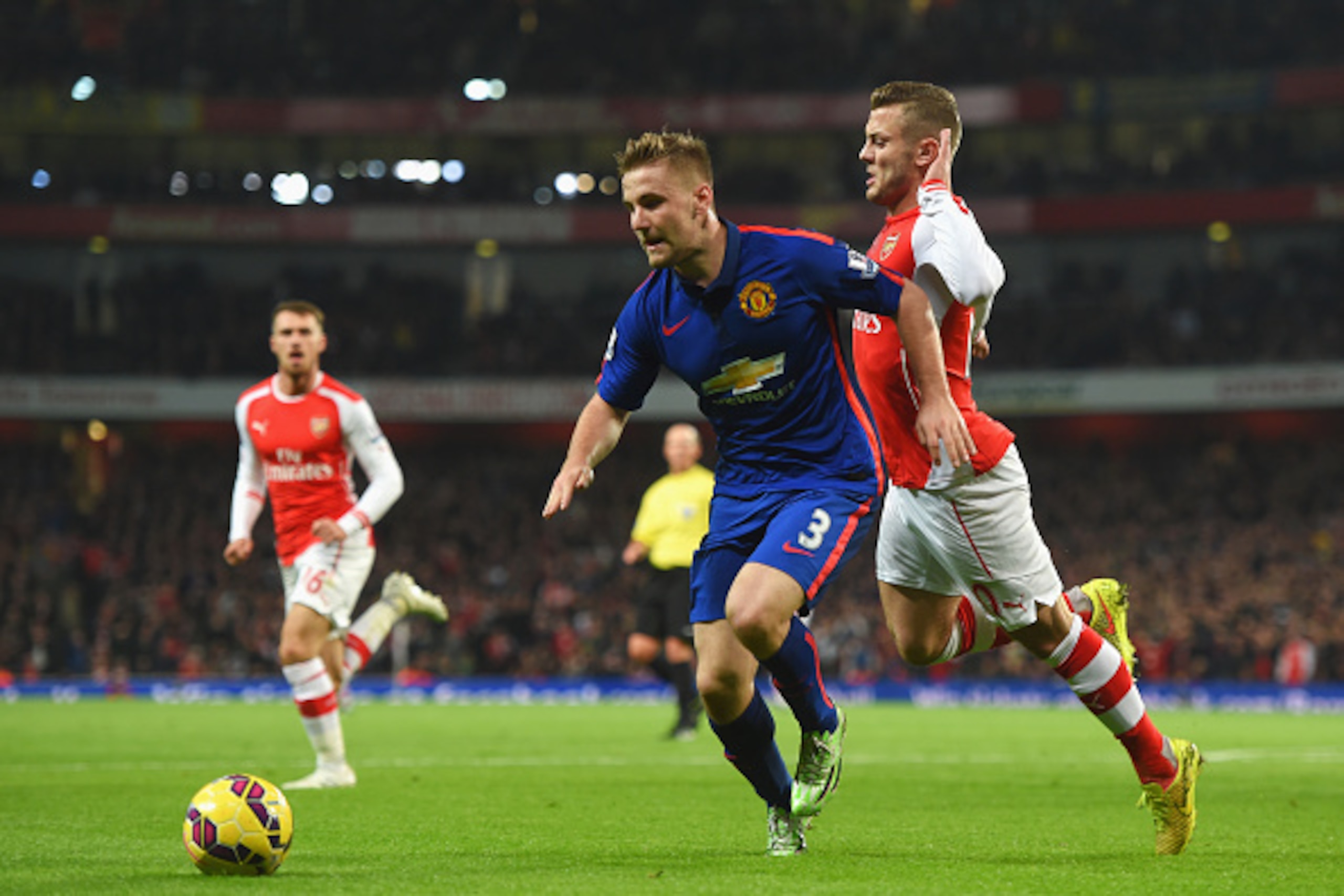 LONDON, ENGLAND - NOVEMBER 22: Jack Wilshere of Arsenal challenges Luke Shaw of Manchester United during the Barclays Premier League match between Arsenal and Manchester United at Emirates Stadium on November 22, 2014 in London, England. (Photo by Micha LONDON, ENGLAND - NOVEMBER 22: Jack Wilshere of Arsenal challenges Luke Shaw of Manchester United during the Barclays Premier League match between Arsenal and Manchester United at Emirates Stadium on November 22, 2014 in London, England. (Photo by Micha