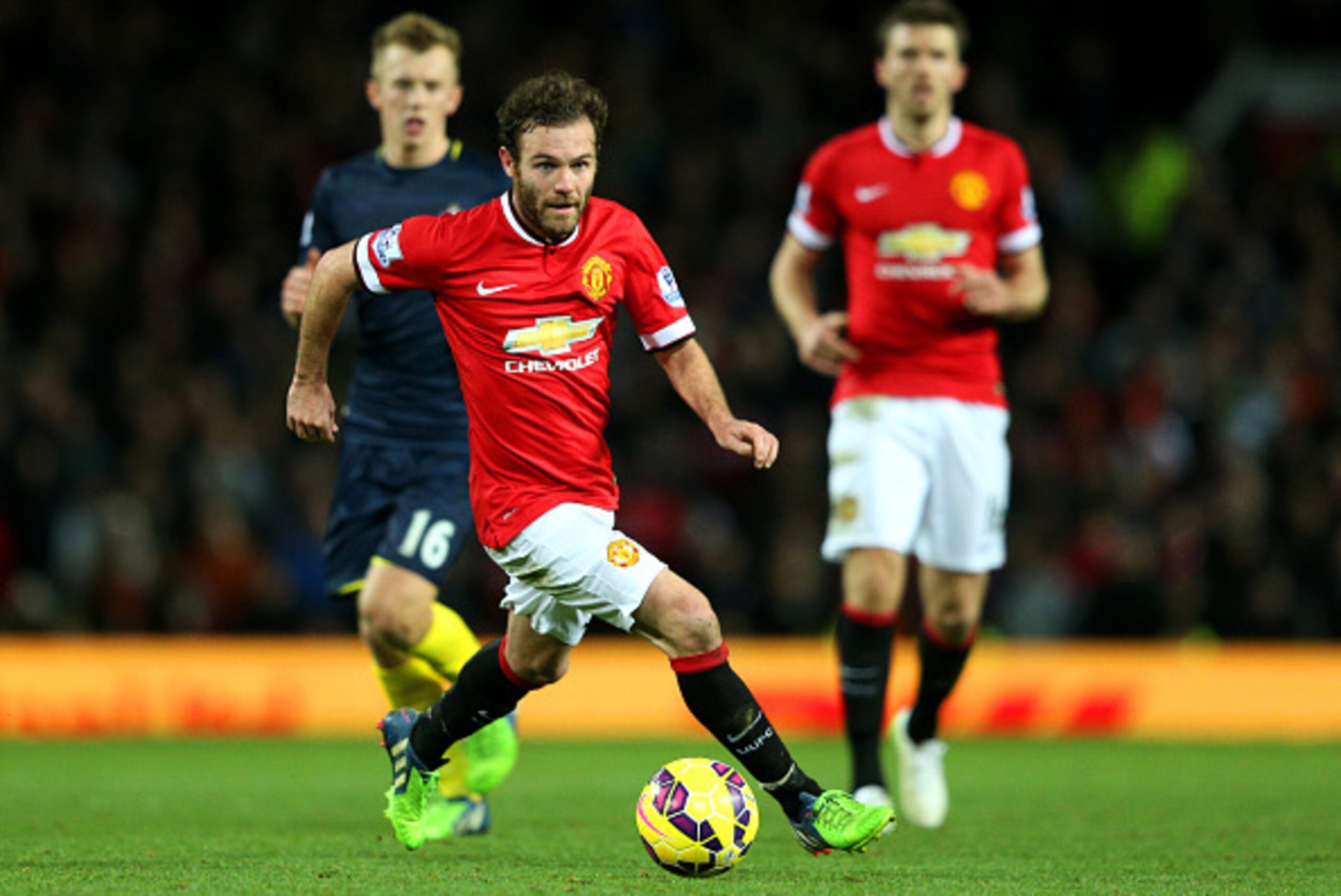 MANCHESTER, ENGLAND - JANUARY 11:  Juan Mata of Manchester United runs with the ball during the Barclays Premier League match between Manchester United and Southampton at Old Trafford on January 11, 2015 in Manchester, England.  (Photo by Clive Mason/Gett