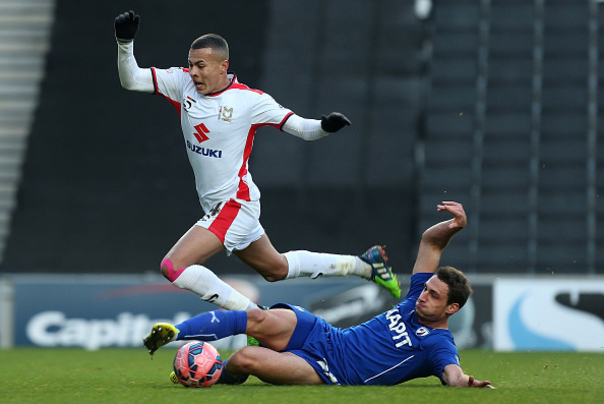 MILTON KEYNES, ENGLAND - DECEMBER 06: Georg Margreitter of Chesterfield clears the ball from Dele Alli of MK Dons during the FA Cup Second Round match between MK Dons and Chesterfield at Stadium mk on December 6, 2014 in Milton Keynes, England. (Photo by MILTON KEYNES, ENGLAND - DECEMBER 06: Georg Margreitter of Chesterfield clears the ball from Dele Alli of MK Dons during the FA Cup Second Round match between MK Dons and Chesterfield at Stadium mk on December 6, 2014 in Milton Keynes, England. (Photo by