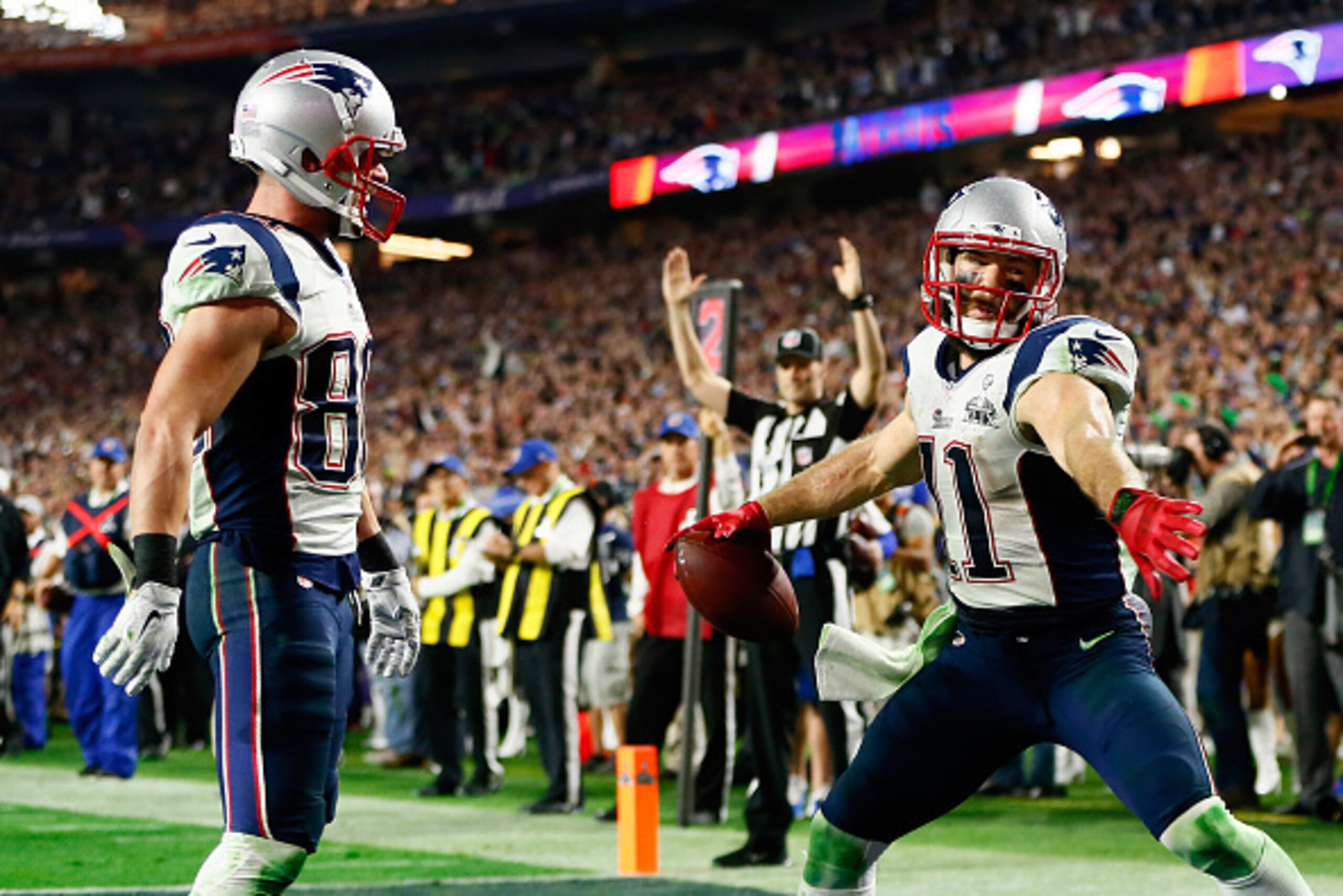 GLENDALE, AZ - FEBRUARY 01:  Julian Edelman #11 of the New England Patriots celebrates with Danny Amendola #80 as he catches a three yard touchdown pass in the fourth quarter against the Seattle Seahawks during Super Bowl XLIX at University of Phoenix Sta