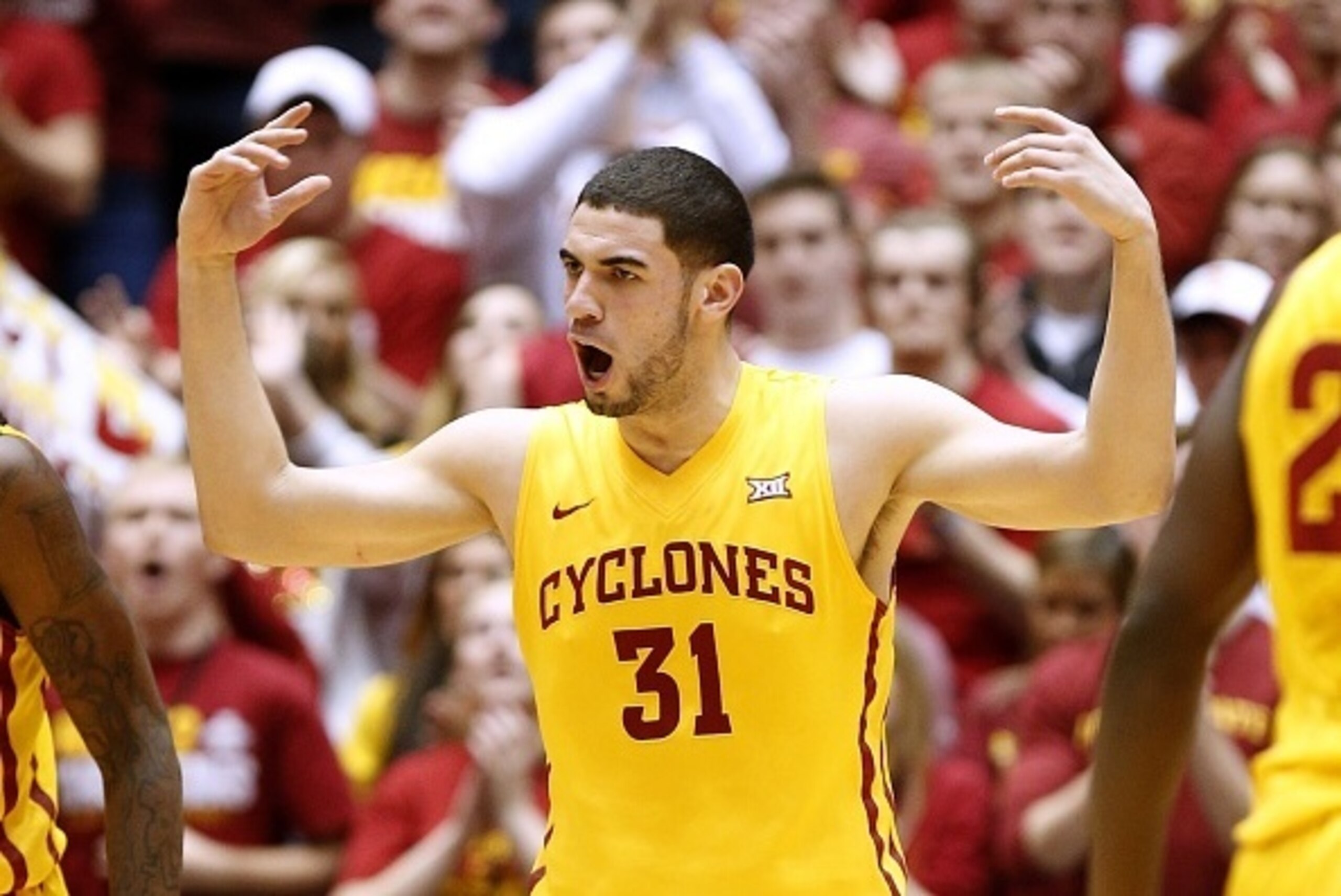 AMES, IA - JANUARY 20:  Georges Niang #31 of the Iowa State Cyclones reacts after sinking a three-point shot in the first half of play against the Kansas State Wildcats at Hilton Coliseum on January 20, 2015 in Ames, Iowa. (Photo by David Purdy/Getty Imag