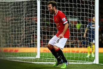 MANCHESTER, ENGLAND - JANUARY 11:  Juan Mata of Manchester United reacts after a missed opportunity during the Barclays Premier League match between Manchester United and Southampton at Old Trafford on January 11, 2015 in Manchester, England.  (Photo by C