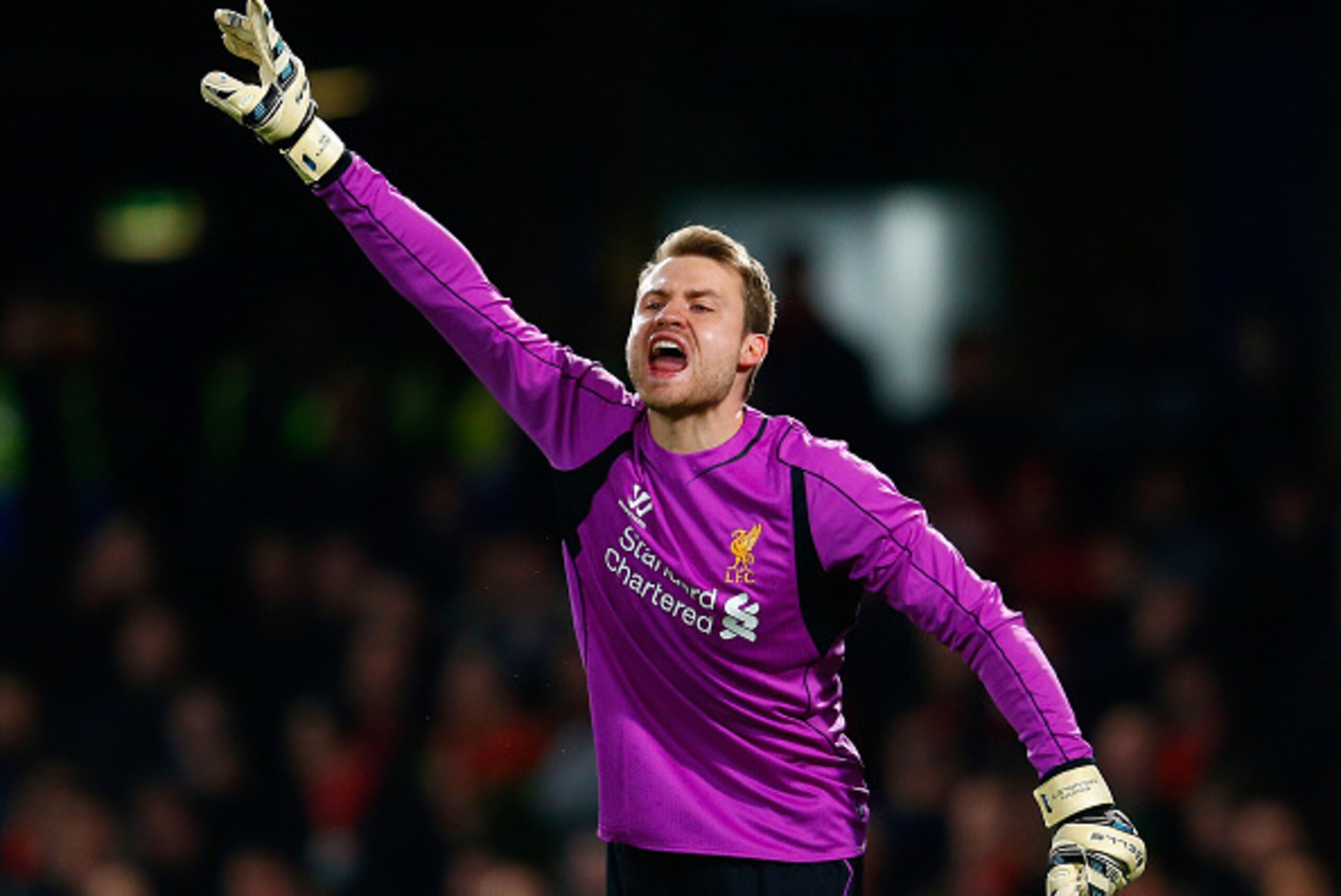 LONDON, ENGLAND - JANUARY 27: Simon Mignolet of Liverpool shouts instructions during the Capital One Cup Semi-Final second leg between Chelsea and Liverpool at Stamford Bridge on January 27, 2015 in London, England. (Photo by Julian Finney/Getty Images) LONDON, ENGLAND - JANUARY 27: Simon Mignolet of Liverpool shouts instructions during the Capital One Cup Semi-Final second leg between Chelsea and Liverpool at Stamford Bridge on January 27, 2015 in London, England. (Photo by Julian Finney/Getty Images)