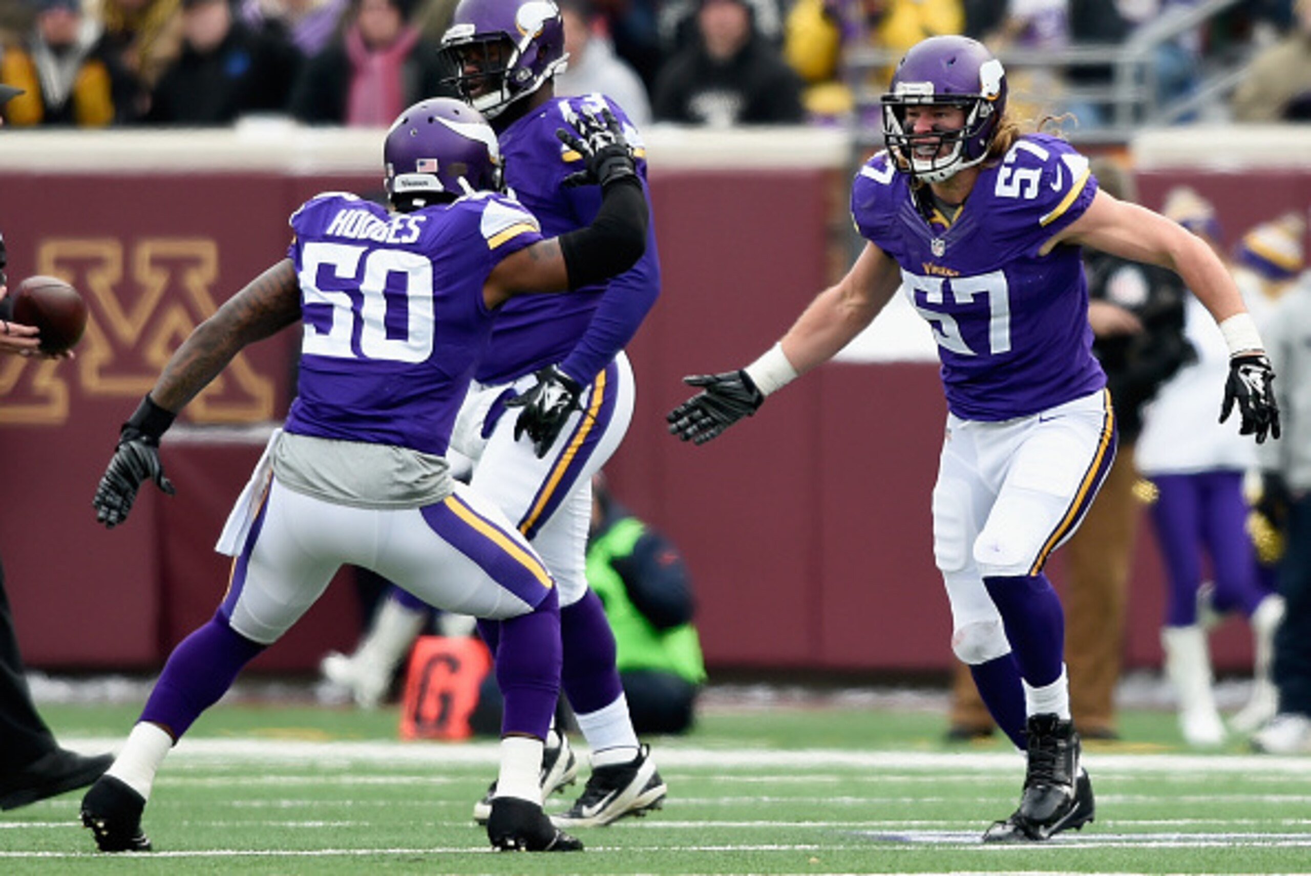 MINNEAPOLIS, MN - DECEMBER 28: Gerald Hodges #50 of the Minnesota Vikings congratulates teammate Audie Cole #57 on a tackle against the Chicago Bears during the first quarter of the game on December 28, 2014 at TCF Bank Stadium in Minneapolis, Minnesota. MINNEAPOLIS, MN - DECEMBER 28: Gerald Hodges #50 of the Minnesota Vikings congratulates teammate Audie Cole #57 on a tackle against the Chicago Bears during the first quarter of the game on December 28, 2014 at TCF Bank Stadium in Minneapolis, Minnesota.