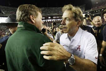Jim McElwain and Nick Saban after a Colorado State loss to Alabama.