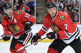 CHICAGO, IL - APRIL 01:  Patrick Sharp #10 and Brent Seabrook #7 of the Chicago Blackhawks chase after the puck during the NHL game against the Minnesota Wild on April 1, 2012 at the United Center in Chicago, Illinois. (Photo by Bill Smith/NHLI via Getty 