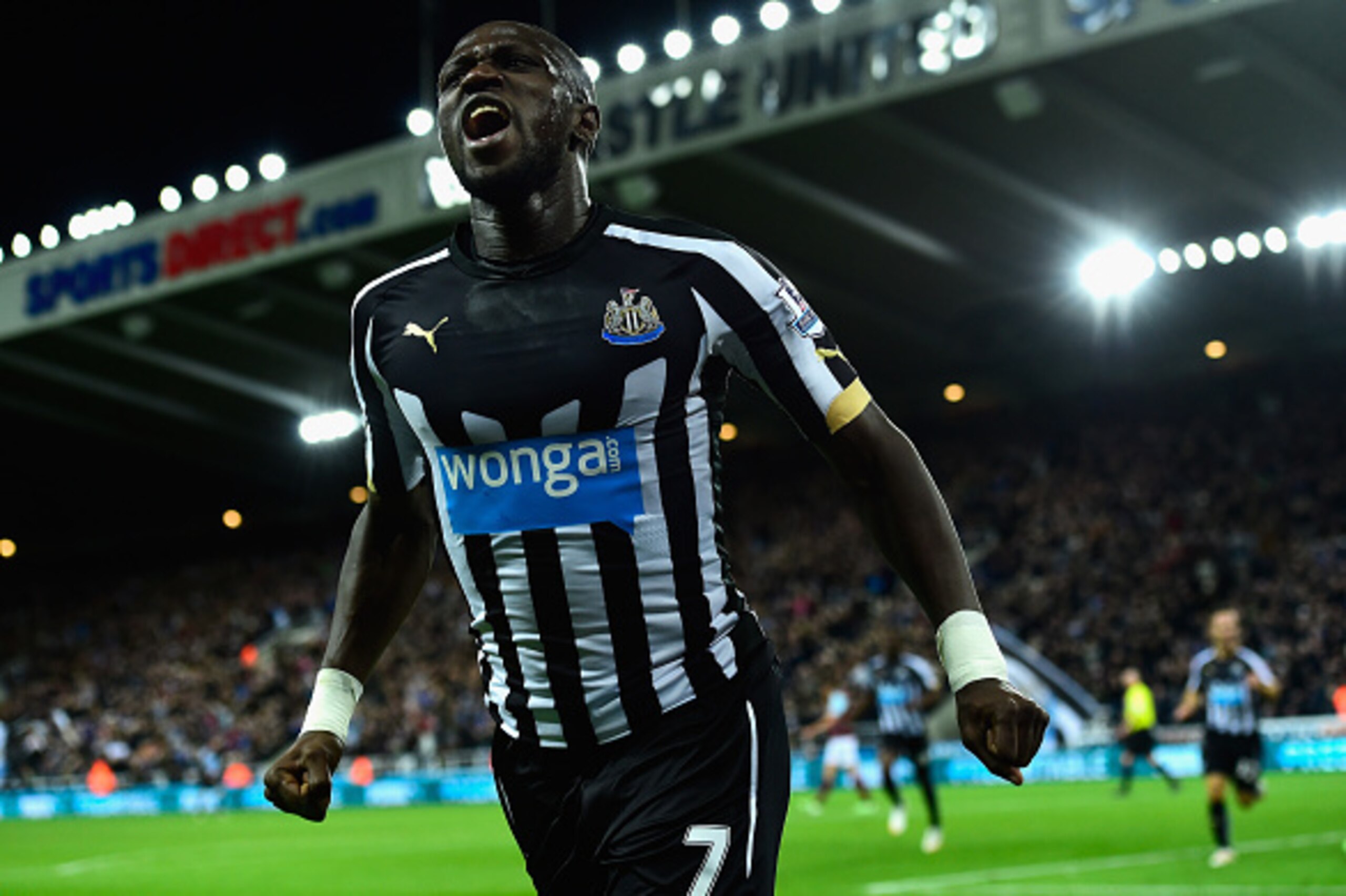 NEWCASTLE UPON TYNE, ENGLAND - JANUARY 01:  Newcastle United player Moussa Sissoko celebrates after scoring their third goal during the Barclays Premier League match between Newcastle United and Burnley at St James' Park on January 1, 2015 in Newcastle up