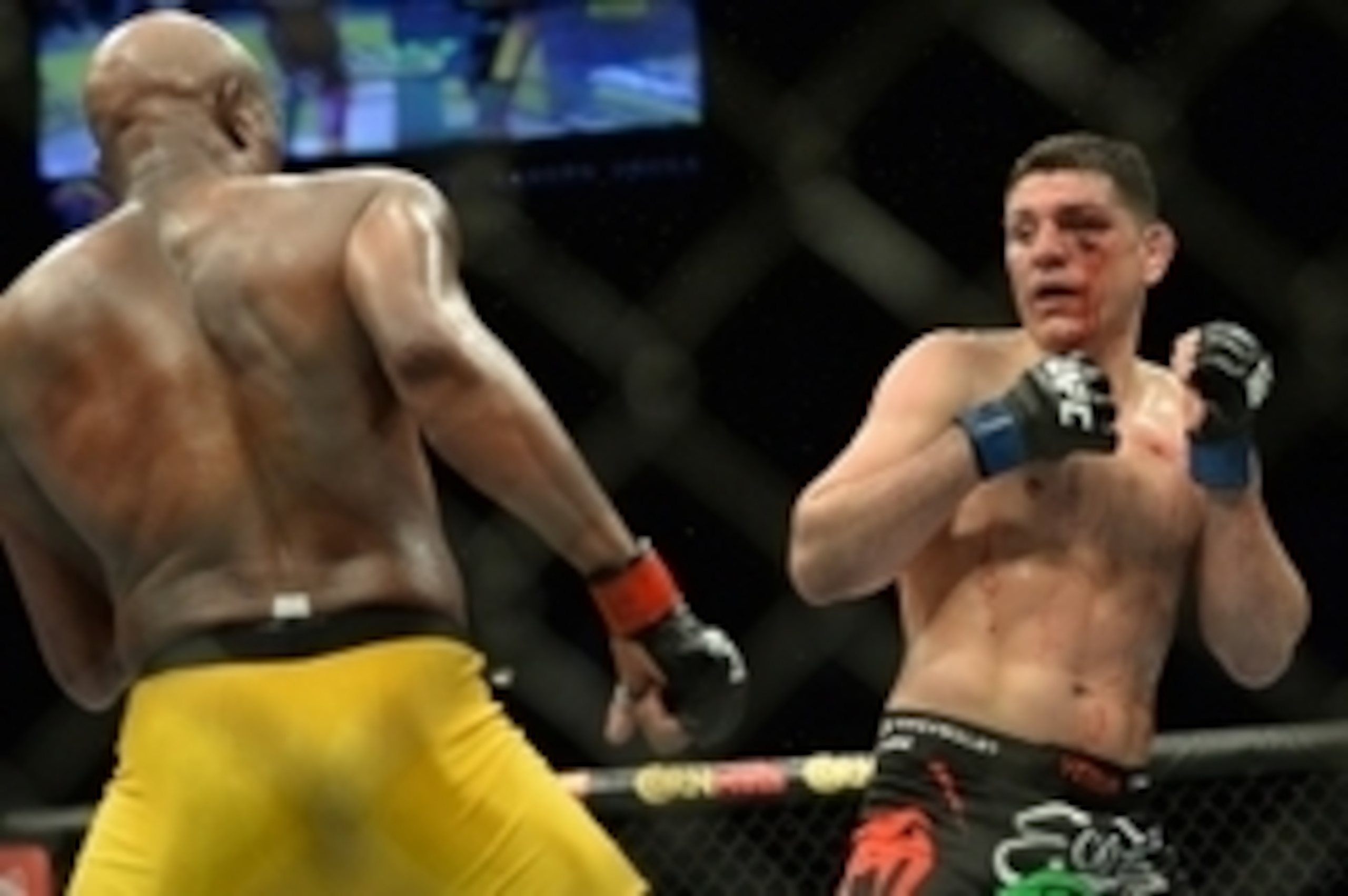 Jan 31, 2015; Las Vegas, NV, USA; Anderson Silva (red gloves) and Nick Diaz (blue gloves) fight during their middleweight bout during UFC 183 at the MGM Grand Garden Arena. Mandatory Credit: Jayne Kamin-Oncea-USA TODAY Sports