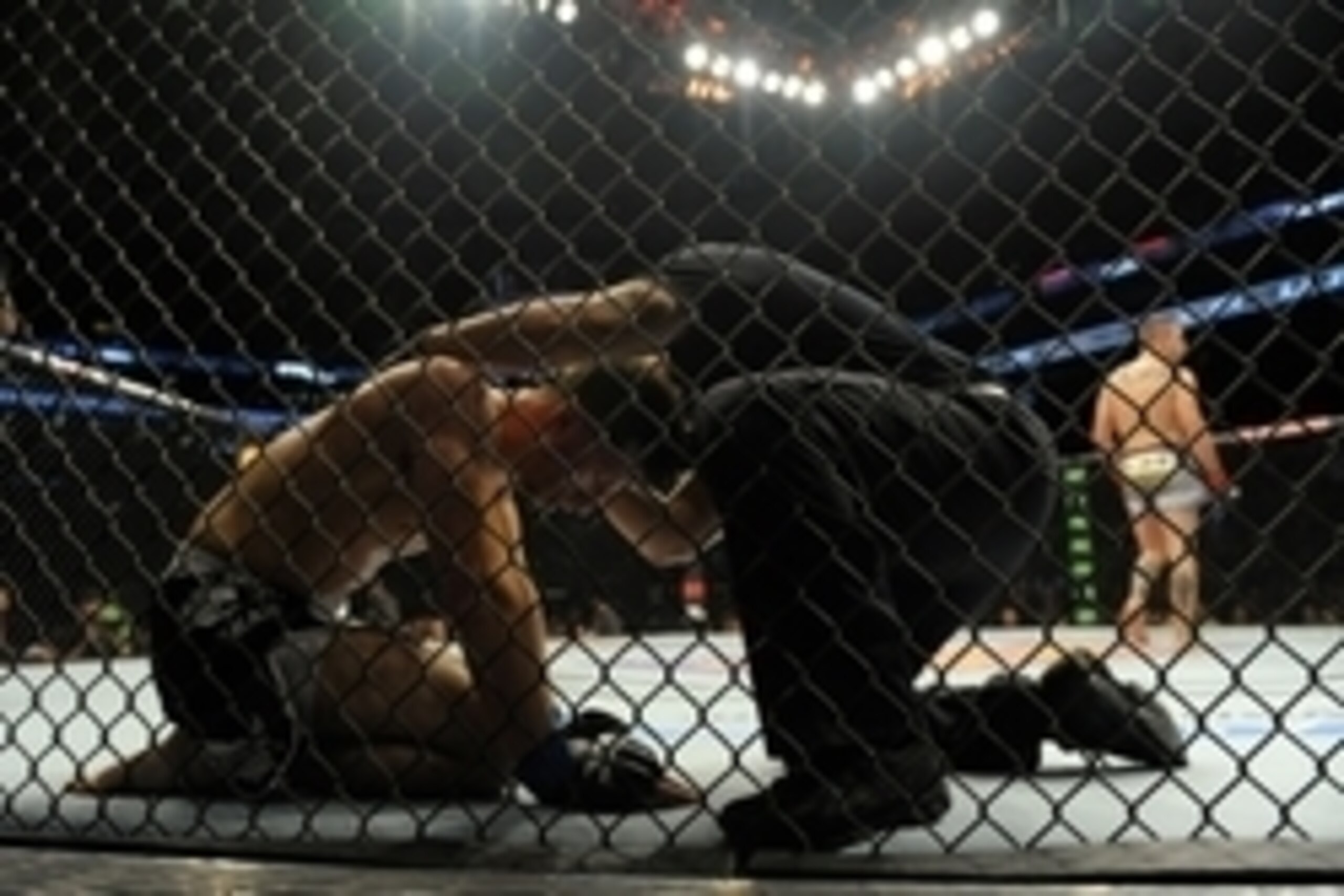 Jan 18, 2015; Boston, MA, USA; Johnny Case (red) walks off after a lightweight bout with Frankie Perez (blue) during a UFC Fight Night at TD Garden. Mandatory Credit: Bob DeChiara-USA TODAY Sports