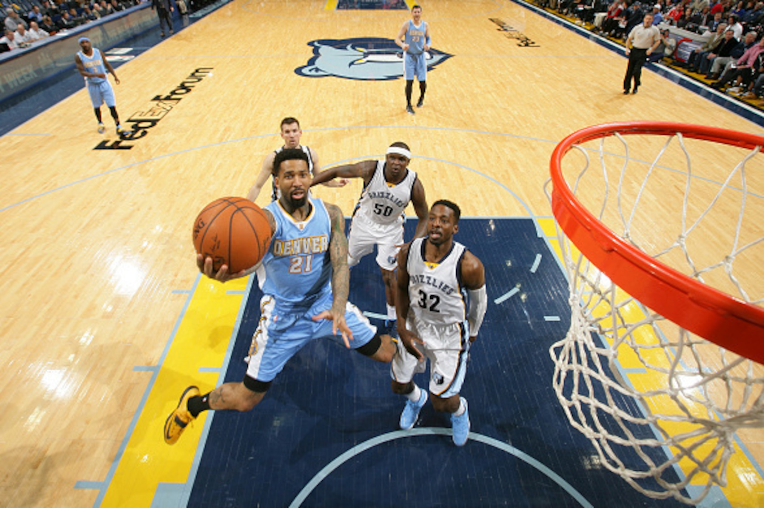 MEMPHIS, TN - JANUARY 29: Wilson Chandler #21 of the Denver Nuggets shoots the ball against the Memphis Grizzlies during the game on January 29, 2015 at FedExForum in Memphis, Tennessee. NOTE TO USER: User expressly acknowledges and agrees that, by downl MEMPHIS, TN - JANUARY 29: Wilson Chandler #21 of the Denver Nuggets shoots the ball against the Memphis Grizzlies during the game on January 29, 2015 at FedExForum in Memphis, Tennessee. NOTE TO USER: User expressly acknowledges and agrees that, by downl