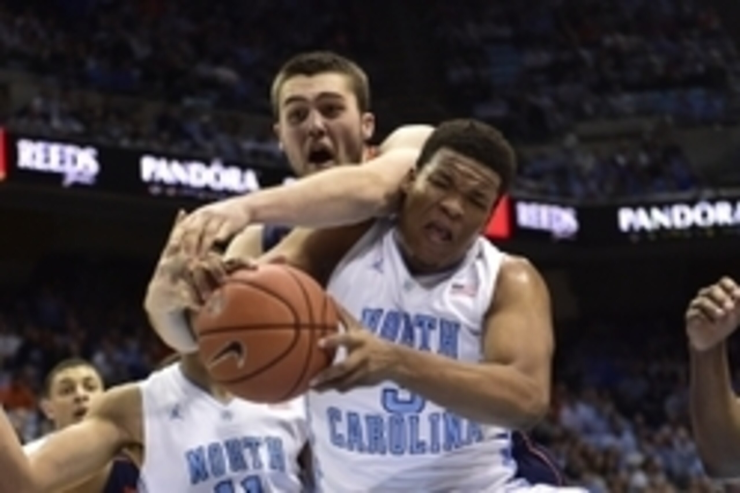 Feb 2, 2015; Chapel Hill, NC, USA; Virginia Cavaliers forward/center Mike Tobey (10) and North Carolina Tar Heels forward Kennedy Meeks (3) fight for the ball in the first half at Dean E. Smith Center. Mandatory Credit: Bob Donnan-USA TODAY Sports