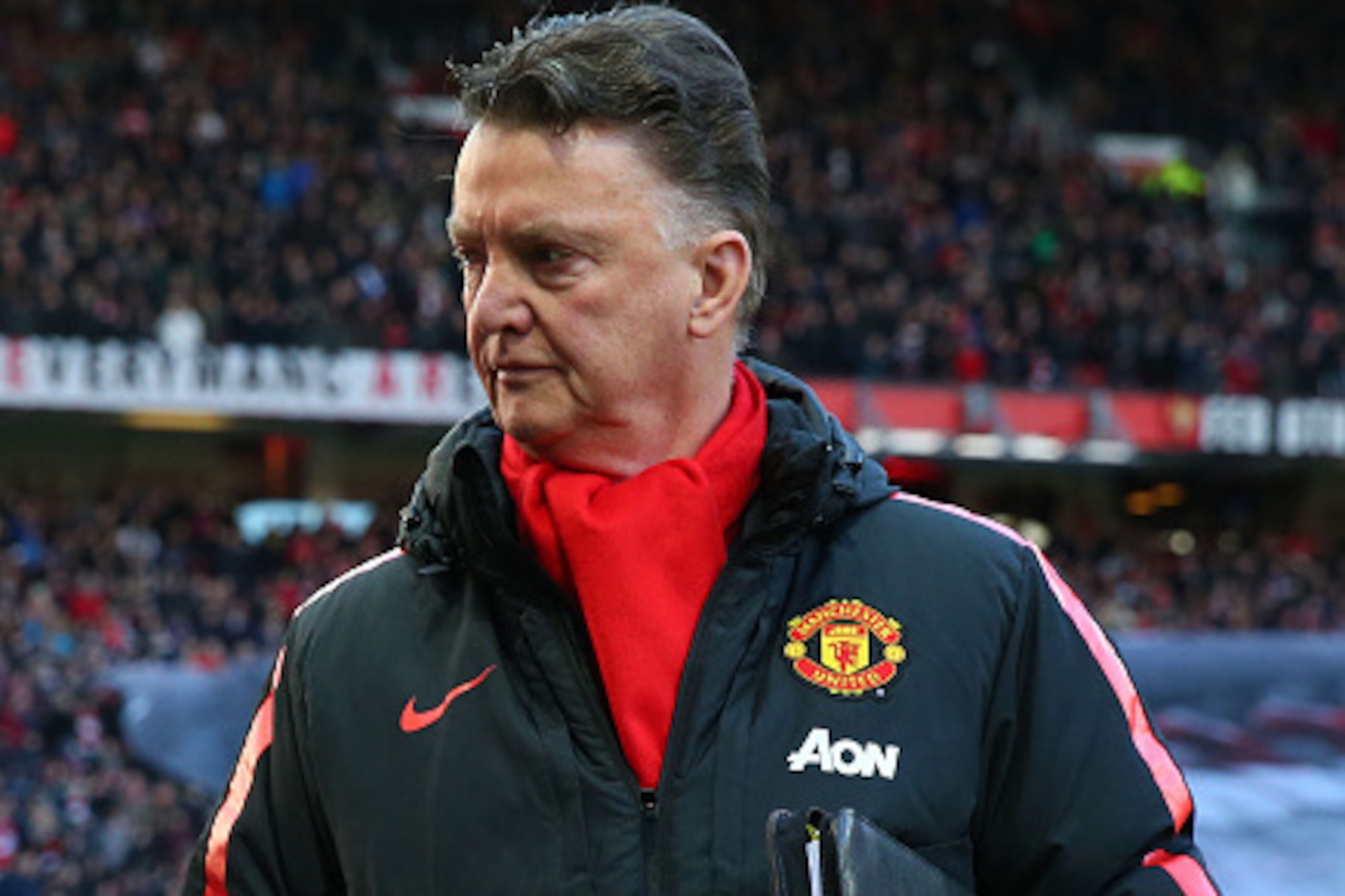 MANCHESTER, ENGLAND - JANUARY 31:  Manager Louis van Gaal of Manchester United takes his seat prior to kickoff during the Barclays Premier League match between Manchester United and Leicester City at Old Trafford on January 31, 2015 in Manchester, England