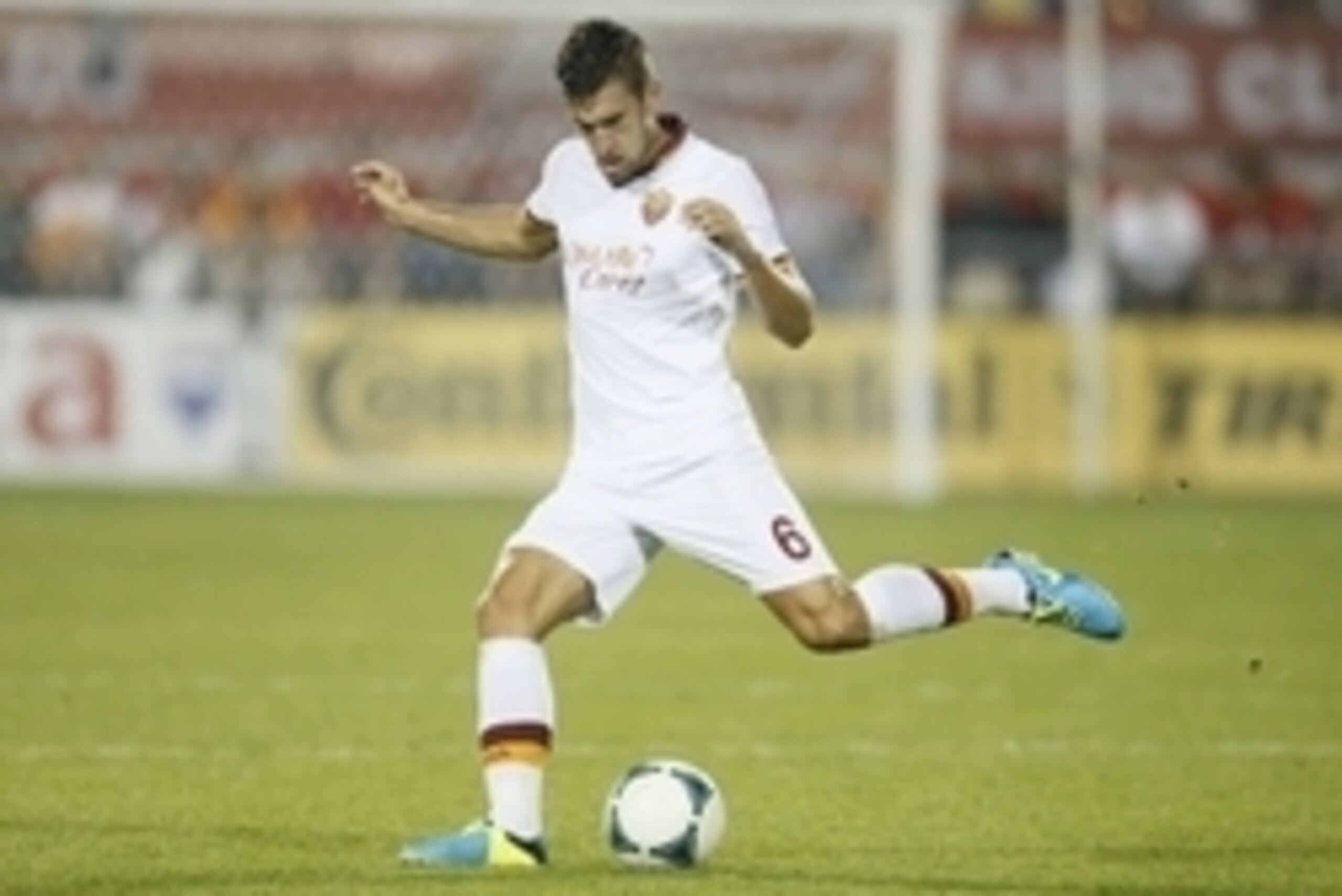 Aug 7, 2013; Toronto, Ontario, Canada; AS Roma midfielder Kevin Strootman (6) kicks the ball against Toronto FC at BMO Field. AS Roma defeated Toronto 4-1. Mandatory Credit: John E. Sokolowski-USA TODAY Sports