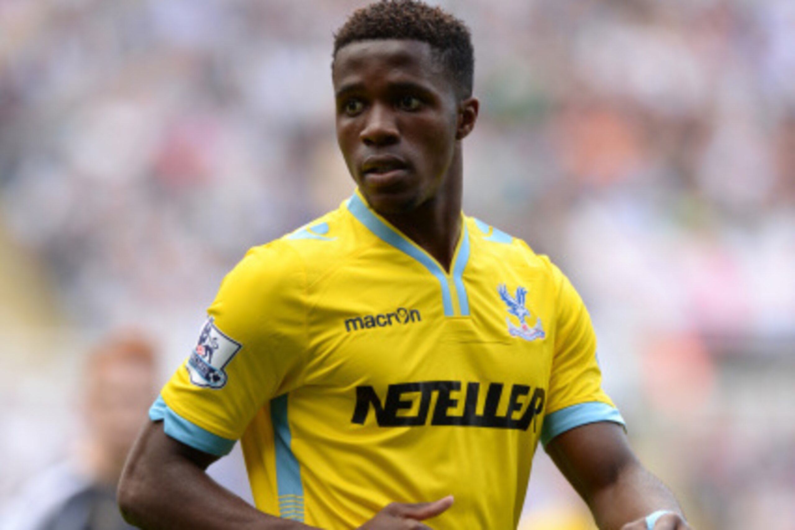 NEWCASTLE UPON TYNE, ENGLAND - AUGUST 30:  Wilfried Zaha of Crystal Palacel during the Barclays Premier League match between Newcastle United and Crystal Palace at St James' Park on August 30, 2014 in Newcastle upon Tyne, England.  (Photo by Tony Marshall