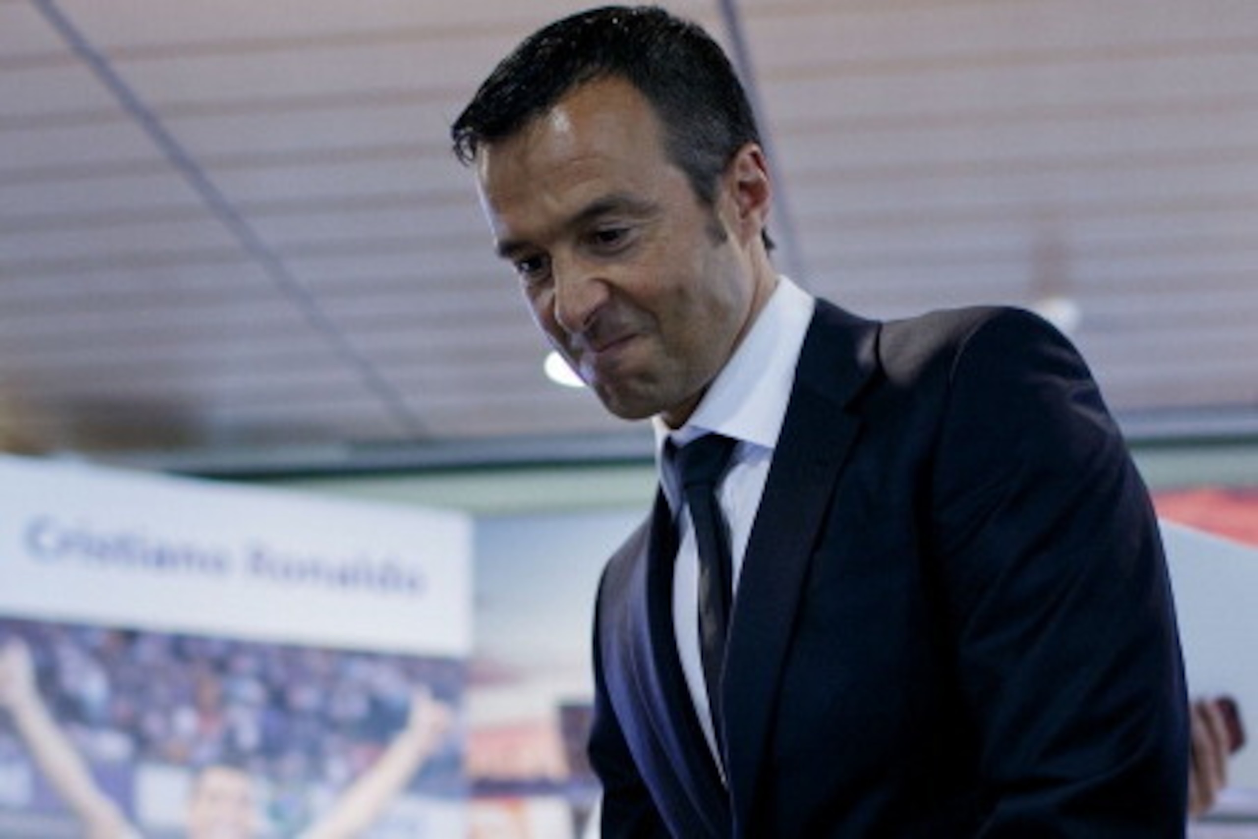 MADRID, SPAIN - SEPTEMBER 15:  Crsitiano Ronaldo«s agent Jorge Mendes takes seat prior to start the press conference after his signing contract renewal For Real Madrid at Estadio Santiago Bernabeu on September 15, 2013 in Madrid, Spain.  (Photo by Gonzalo