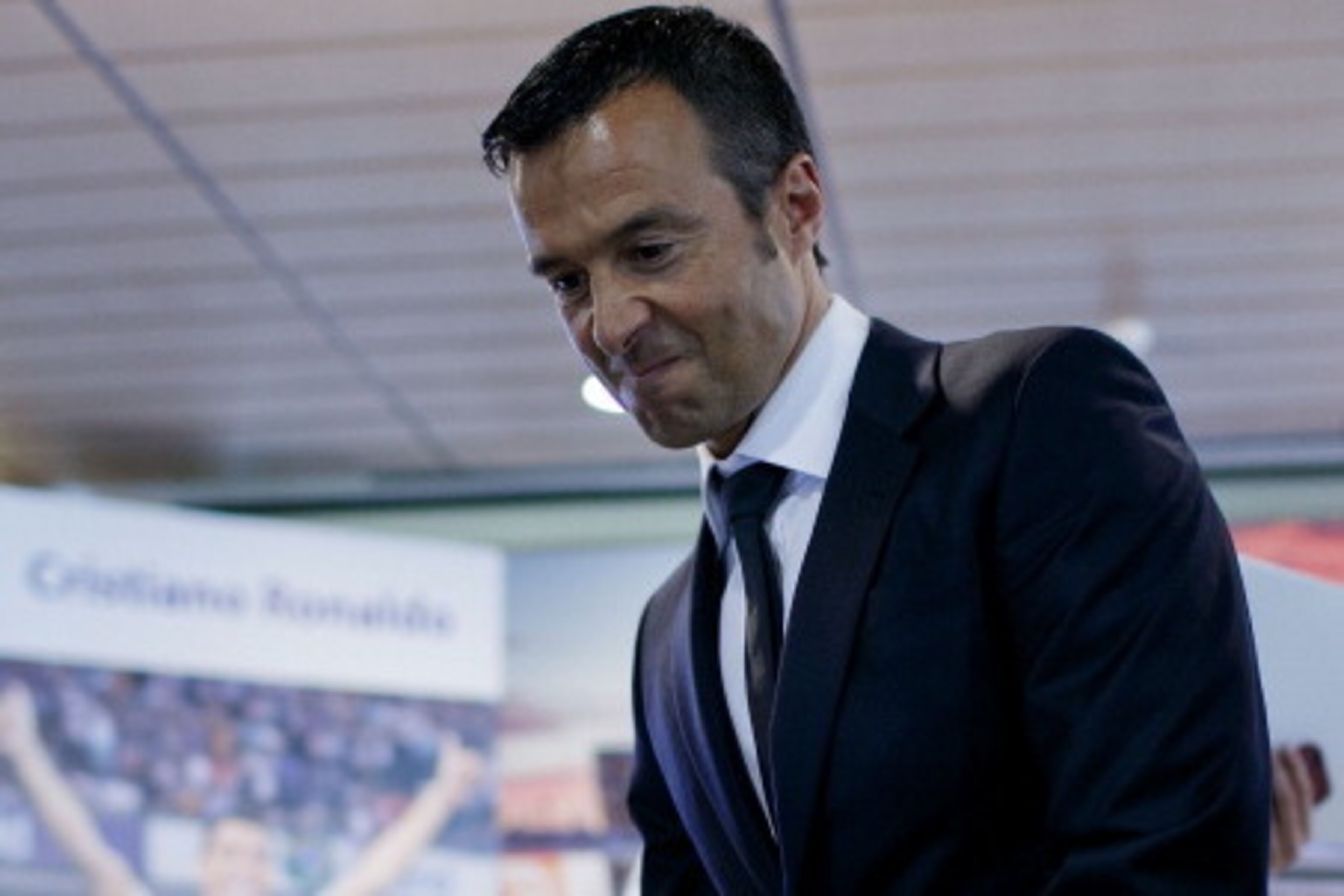MADRID, SPAIN - SEPTEMBER 15:  Crsitiano Ronaldo«s agent Jorge Mendes takes seat prior to start the press conference after his signing contract renewal For Real Madrid at Estadio Santiago Bernabeu on September 15, 2013 in Madrid, Spain.  (Photo by Gonzalo