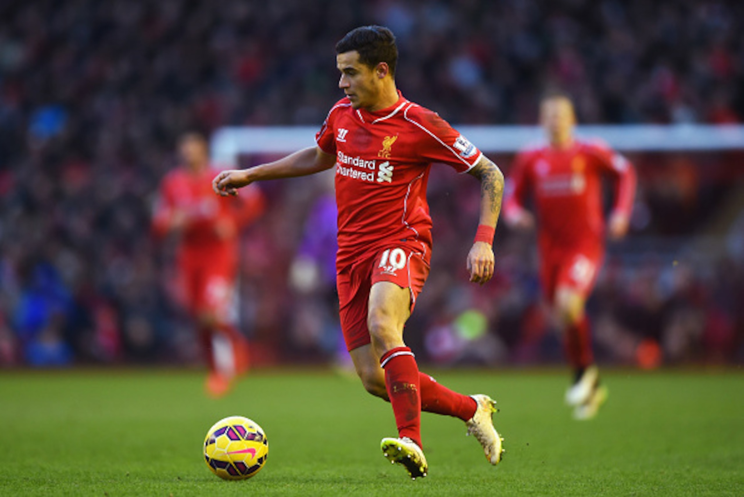 LIVERPOOL, ENGLAND - JANUARY 31: Philippe Coutinho of Liverpool in action during the Barclays Premier League match between Liverpool and West Ham United at Anfield on January 31, 2015 in Liverpool, England.  (Photo by Shaun Botterill/Getty Images)