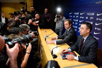 BARCELONA, SPAIN - JANUARY 23:  FCB President Sandro Rosell (L) and FCB Vice-President Josep Maria Bartomeu face the media during the press conference announcing his resgination as FCB president on January 23, 2014 in Barcelona, Spain. FCB President Sandr