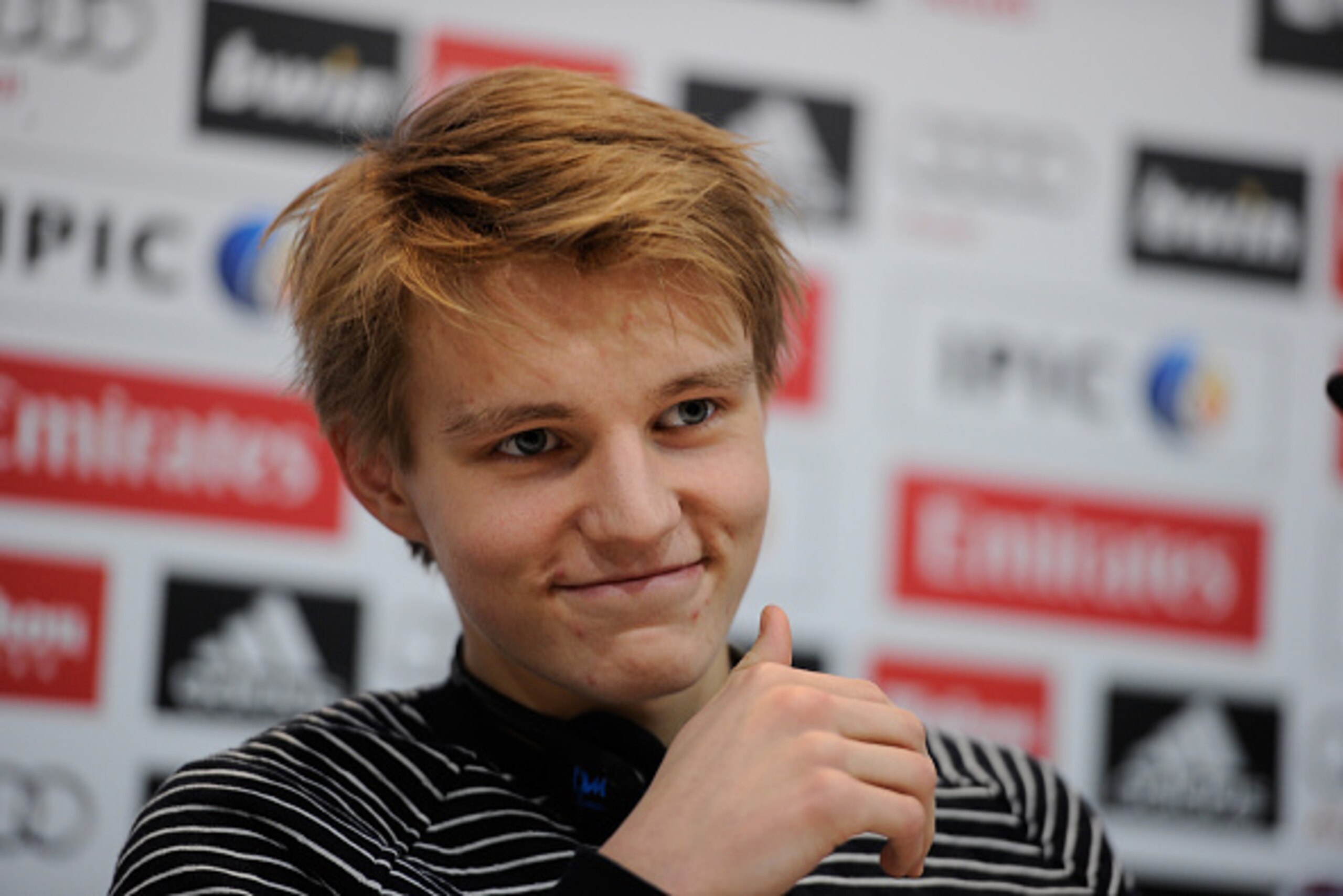 MADRID, SPAIN - JANUARY 22:  Martin Odegaard from Norway smiles during his press conference at Real Madrid's Valdebebas training grounds after he signed with Real on January 22, 2015 in Madrid, Spain.  (Photo by Denis Doyle/Getty Images)