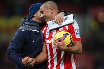 STOKE ON TRENT, ENGLAND - JANUARY 31:  Jonathan Walters of Stoke City carries the matchball after the Barclays Premier League match between Stoke City and Queens Park Rangers at Britannia Stadium on January 31, 2015 in Stoke on Trent, England.  (Photo by 