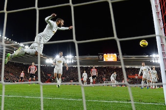 SOUTHAMPTON, ENGLAND - FEBRUARY 01:  Ashley Williams of Swansea heads off the line during the Barclays Premier League match between Southampton and Swansea City at St Mary's Stadium on February 1, 2015 in Southampton, England.  (Photo by Mike Hewitt/Getty