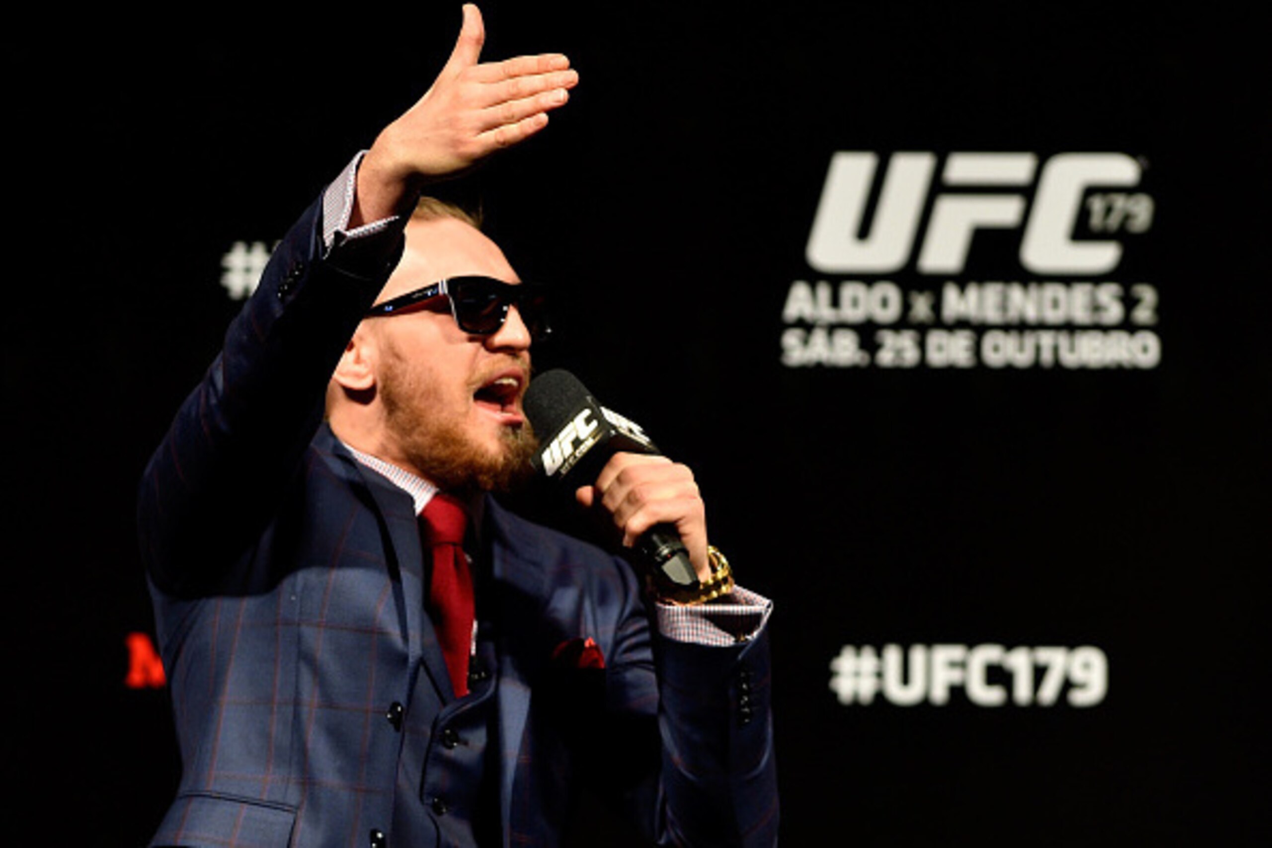 RIO DE JANEIRO, BRAZIL - OCTOBER 24:  Conor McGregor of Ireland interacts with fans during a Q&A session before the UFC 179 weigh-in  at Maracanazinho on October 24, 2014 in Rio de Janeiro, Brazil.  (Photo by Buda Mendes/Getty Images)