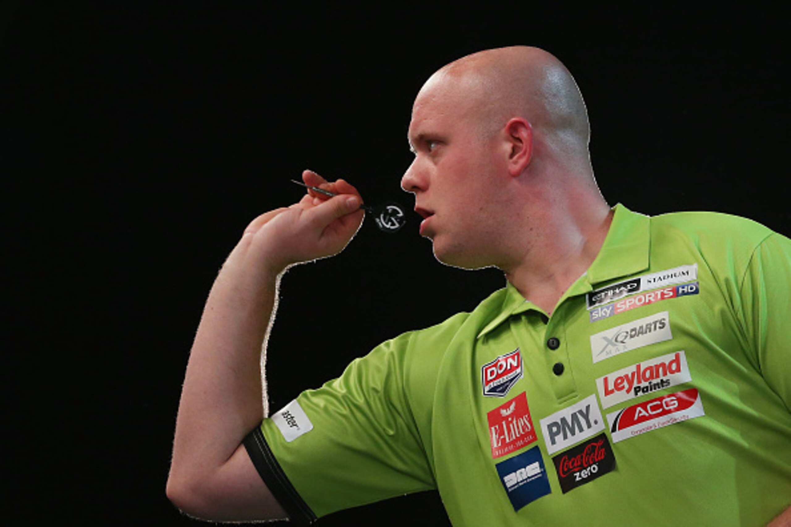 MELBOURNE, AUSTRALIA - JANUARY 10:  Michael van Gerwen in action during the final between Simon The Wizard Whitlock and Mighty Michael van Gerwen during the Invitational Darts Challenge at Etihad Stadium on January 10, 2015 in Melbourne, Australia.  (Phot
