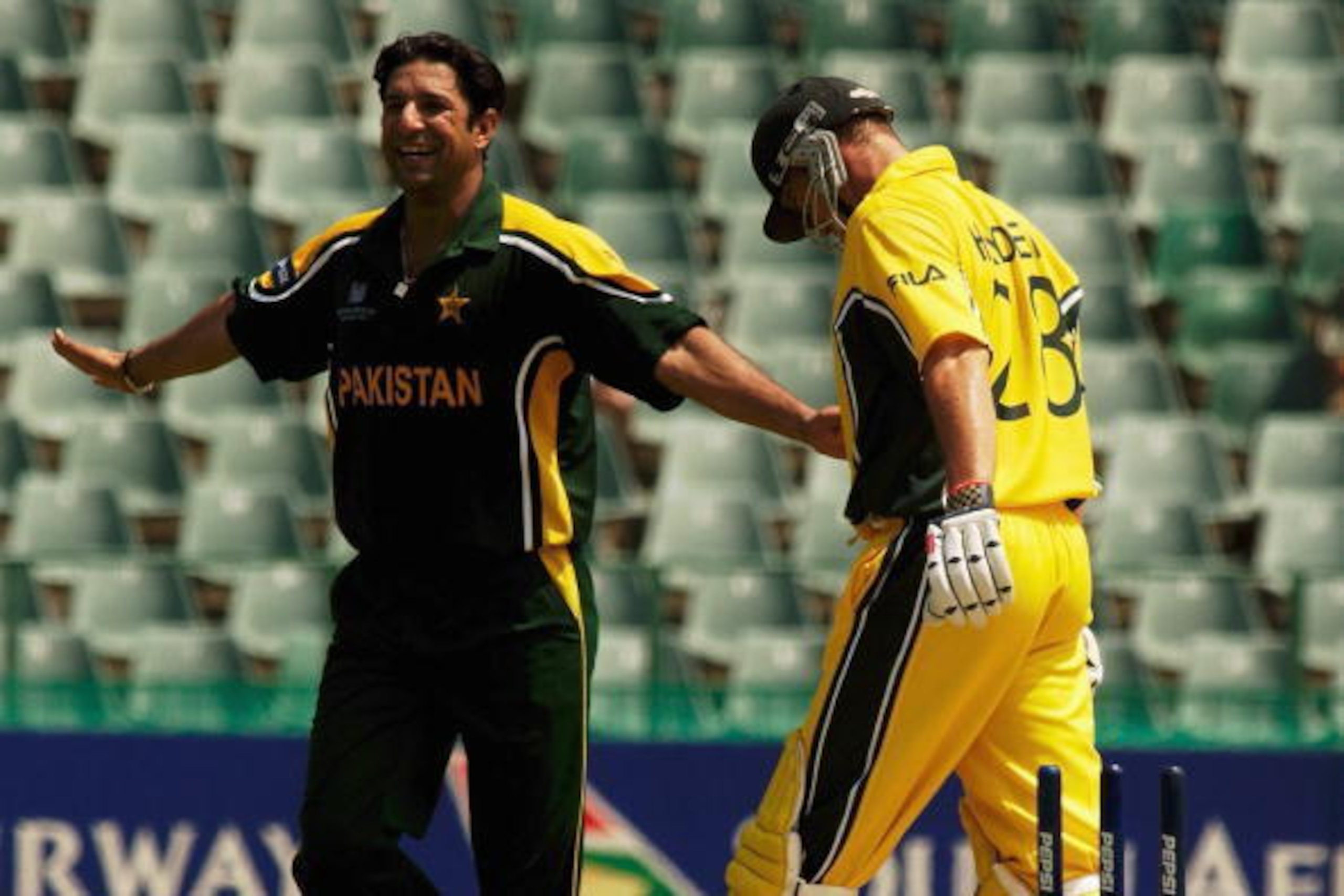 JOHANNESBURG - FEBRUARY 11:  Wasim Akram of Pakistan celebrates the wicket of Matthew Hayden of Australia during the ICC Cricket World Cup 2003 Pool A match between Australia and Pakistan held on February 11, 2003 at The Wanderers, in Johannesburg, South 