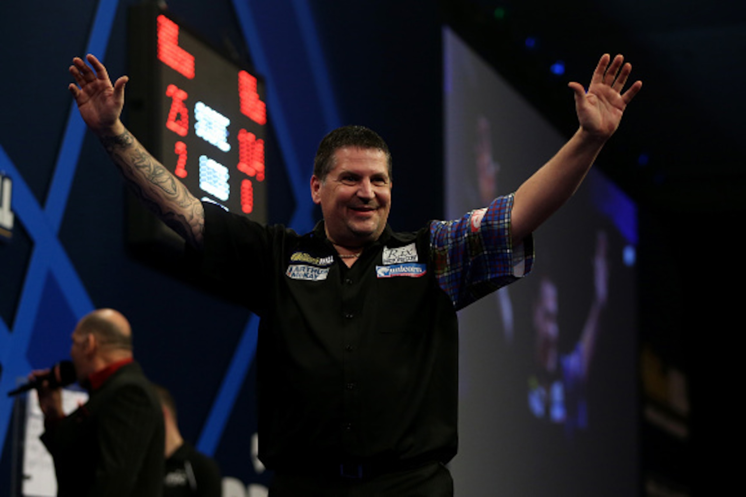 LONDON, ENGLAND - JANUARY 04:  Gary Anderson of Scotland celebrates after winning  the final of the 2015 William Hill PDC World Darts Championships at Alexandra Palace on January 4, 2015 in London, England.  (Photo by Ben Hoskins/Getty Images)