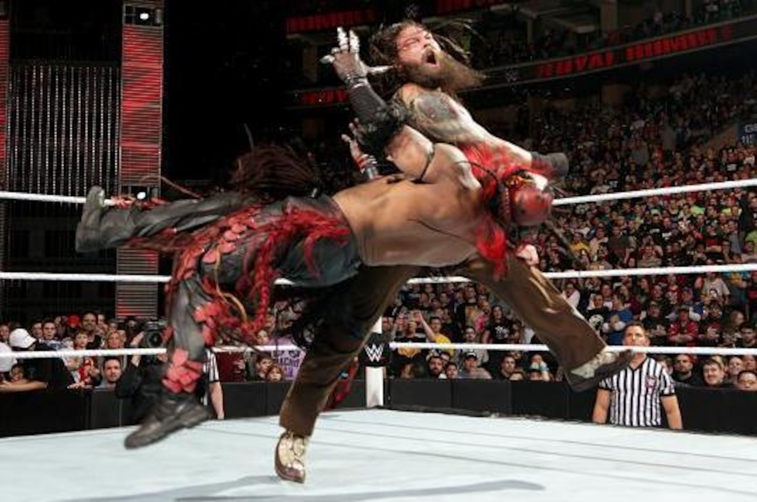Bray Wyatt attacks Boogeyman.