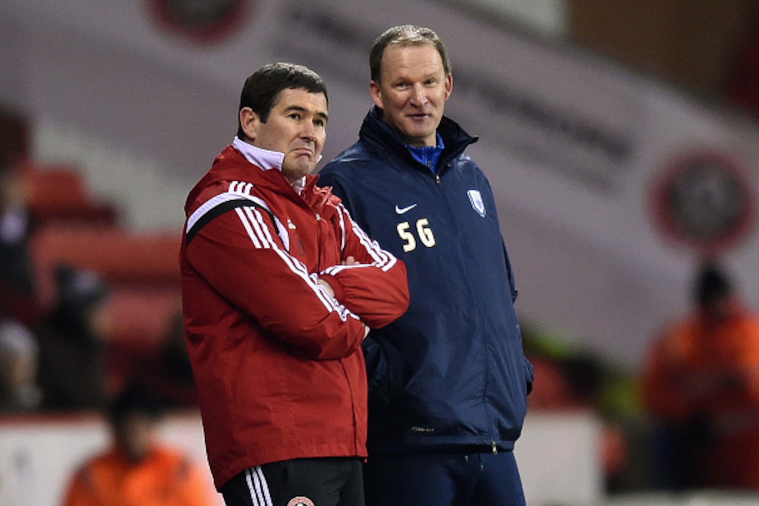 SHEFFIELD, ENGLAND - FEBRUARY 03:  Sheffield United manager Nigel Clough looks on with Preston manager Simon Grayson during the FA Cup Fourth Round match between Sheffield United and Preston North End at Bramall Lane on February 3, 2015 in Sheffield, Engl
