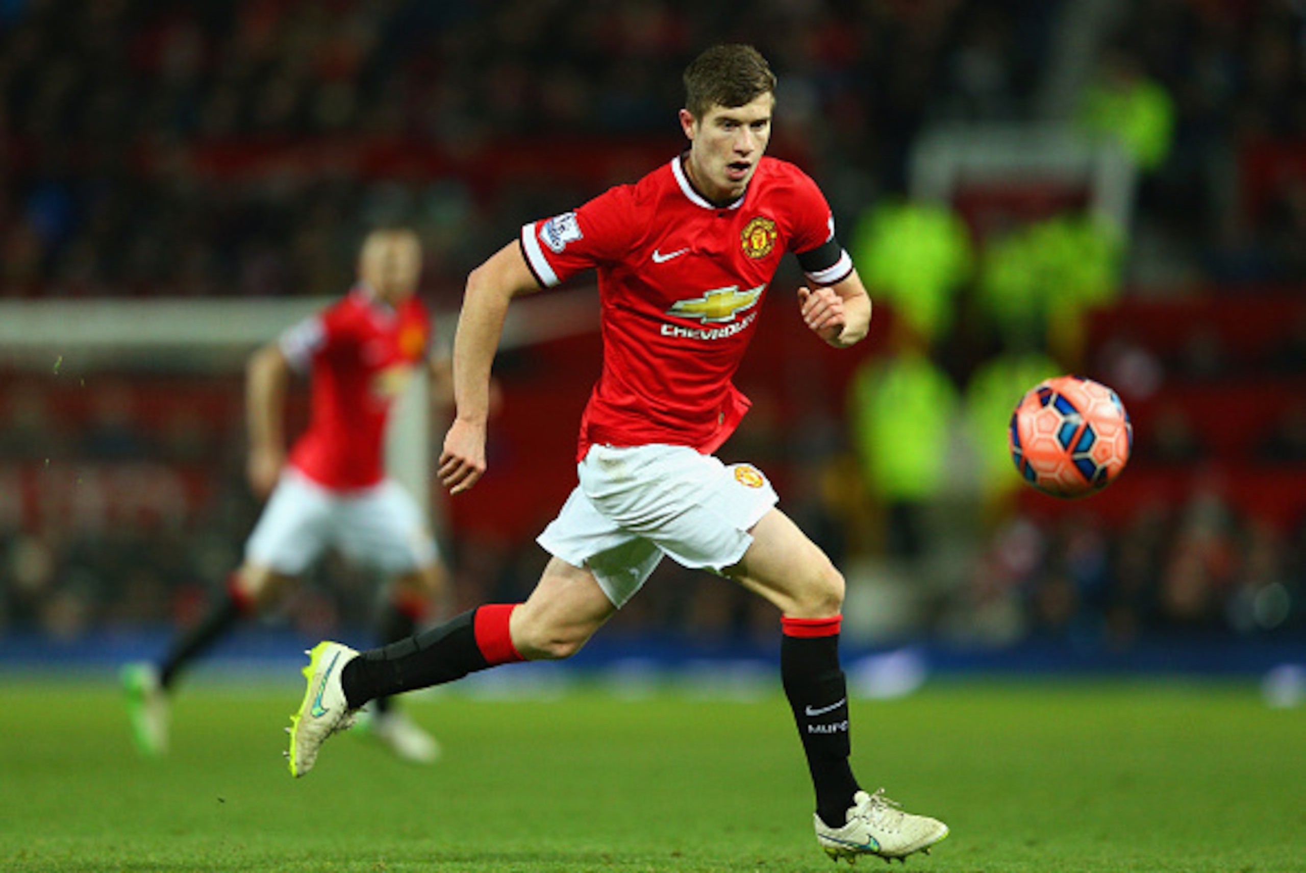 MANCHESTER, ENGLAND - FEBRUARY 03: Paddy McNair of Manchester United on the ball during the FA Cup Fourth round replay match between Manchester United and Cambridge United at Old Trafford on February 3, 2015 in Manchester, England.  (Photo by Clive Mason/