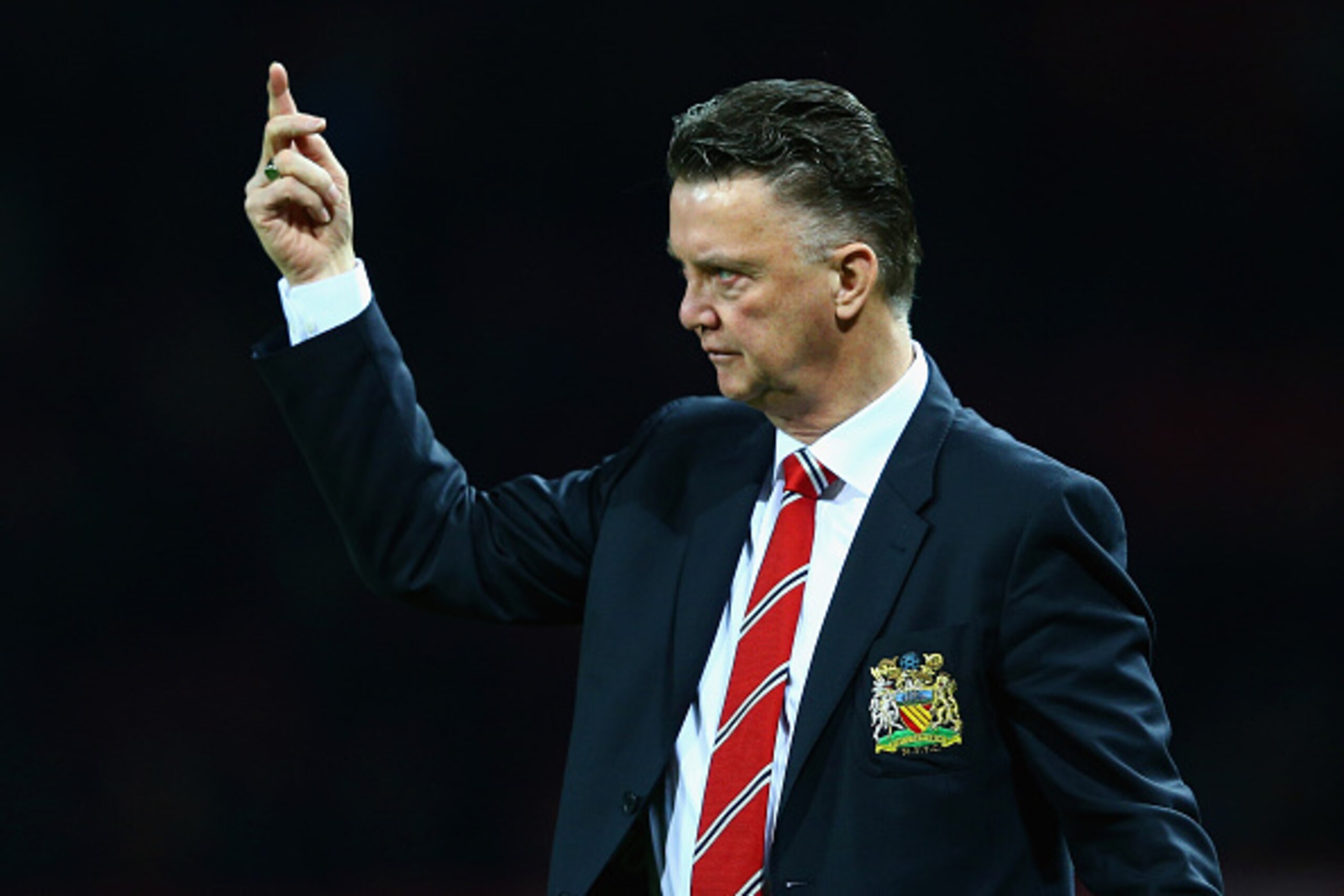 MANCHESTER, ENGLAND - FEBRUARY 03:  Manager Louis van Gaal of Manchester United gestures during the FA Cup Fourth round replay match between Manchester United and Cambridge United at Old Trafford on February 3, 2015 in Manchester, England.  (Photo by Cliv