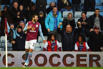 BIRMINGHAM, ENGLAND - JANUARY 25: Carles Gil of Aston Villa celebrates scoring the opening goal during the FA Cup Fourth Round match between Aston Villa and AFC Bournemouth at Villa Park on January 25, 2015 in Birmingham, England.  (Photo by Shaun Botteri