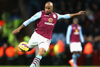 BIRMINGHAM, ENGLAND - JANUARY 17:  Fabian Delph of Aston Villa on th ball during the Barclays Premier League match between Aston Villa and Liverpool at Villa Park on January 17, 2015 in Birmingham, England.  (Photo by Clive Mason/Getty Images)