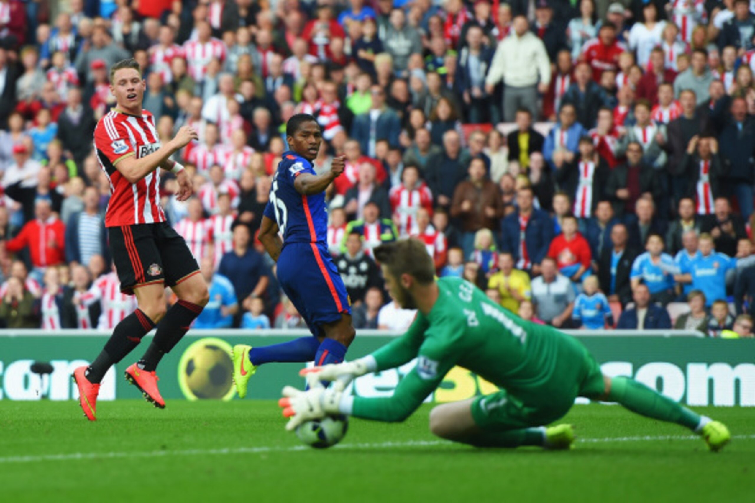 SUNDERLAND, ENGLAND - AUGUST 24: Connor Wickham of Sunderland has his shot saved by David De Gea of Manchester United during the Barclays Premier League match between Sunderland and Manchester United at Stadium of Light on August 24, 2014 in Sunderland, E