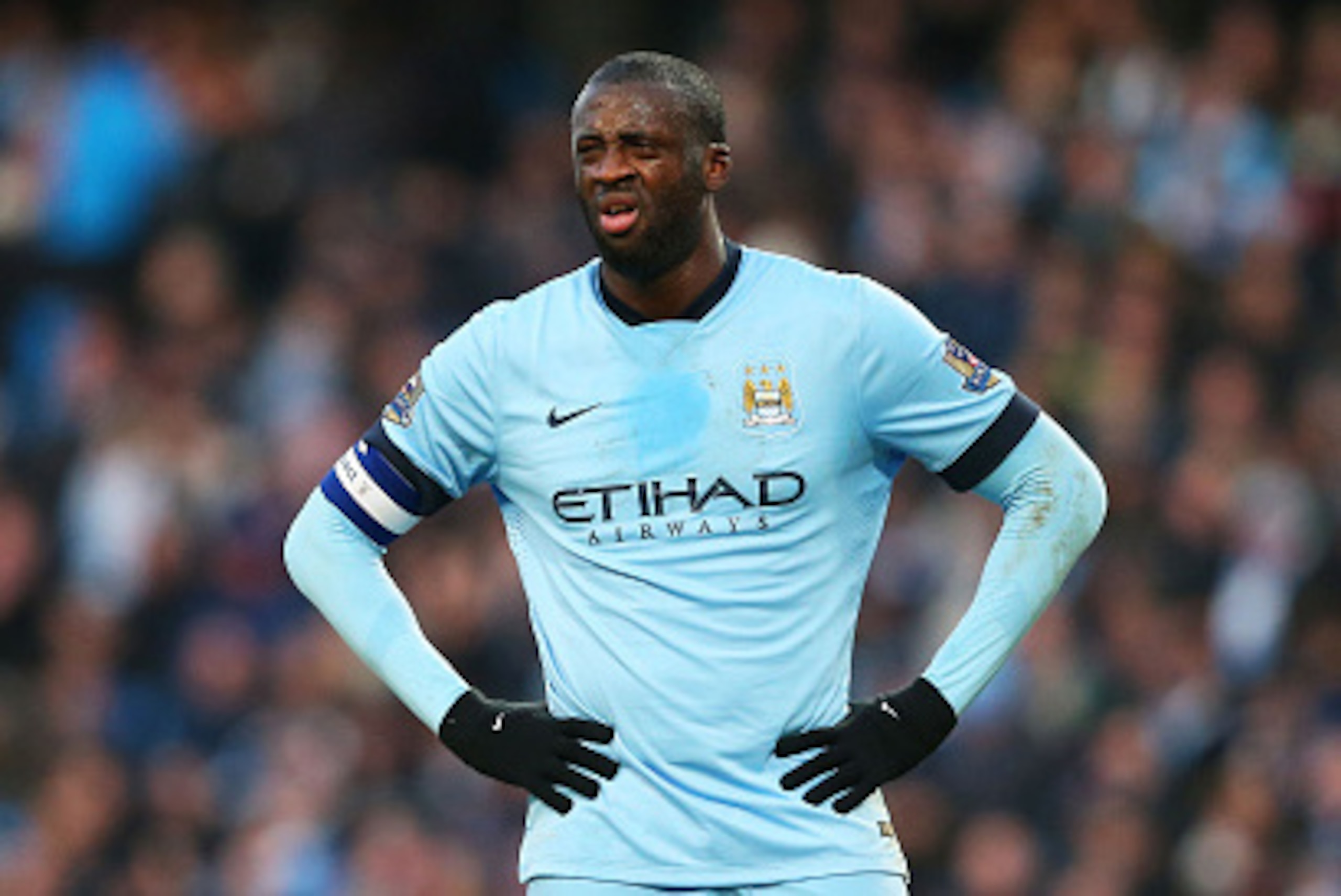 MANCHESTER, ENGLAND - JANUARY 04:  A dejected Yaya Toure of Manchester City reacts during the FA Cup Third Round match between  Manchester City and Sheffield Wednesday at Etihad Stadium on January 4, 2015 in Manchester, England.  (Photo by Alex Livesey/Ge