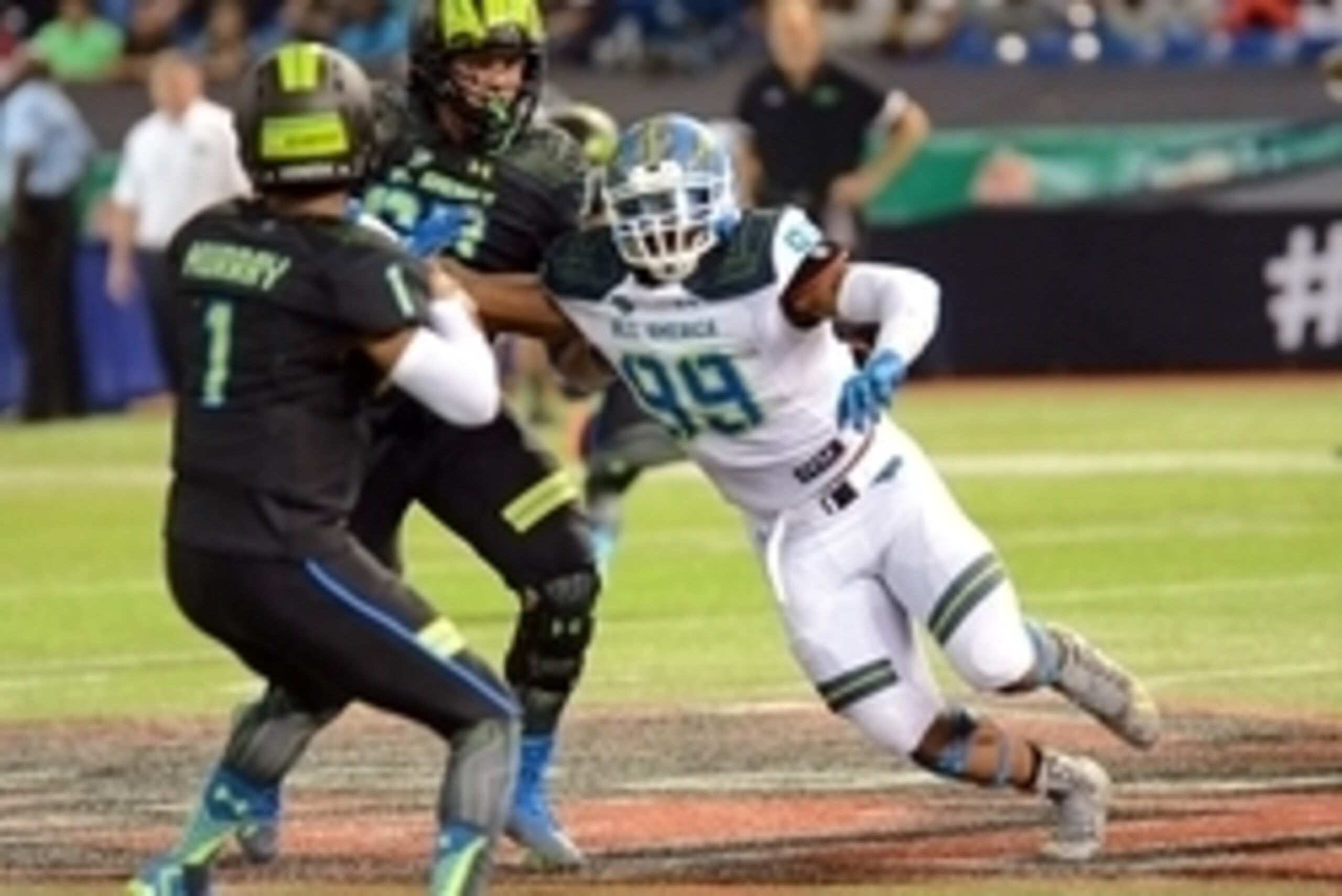 Jan 2, 2015; St. Petersburg, FL, USA; Team Highlight defensive end Byron Cowart (99) rushes the quarterback during the second half of the 2015 Under Armour All-America Game at Tropicana Field. Team Highlight defeated Team Armour 46-6. Mandatory Credit: J Jan 2, 2015; St. Petersburg, FL, USA; Team Highlight defensive end Byron Cowart (99) rushes the quarterback during the second half of the 2015 Under Armour All-America Game at Tropicana Field. Team Highlight defeated Team Armour 46-6. Mandatory Credit: J