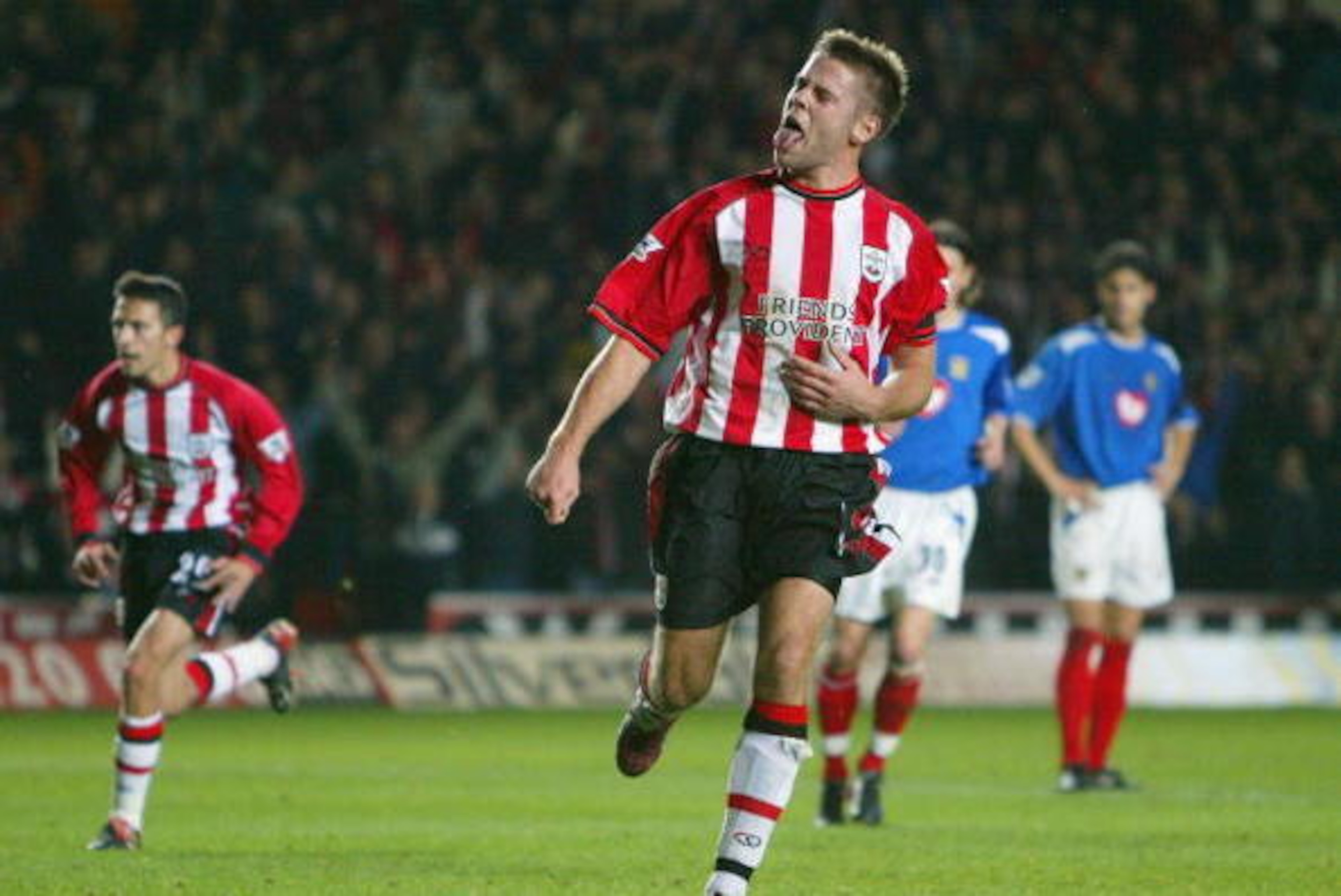 SOUTHAMPTON, ENGLAND - DECEMBER 2:  James Beattie of Southampton celebrates scoring his goal from the penalty spot during the Carling Cup fourth round match between Southampton and Portsmouth at St. Mary's Stadium on December 2, 2003 in Southampton, Engla