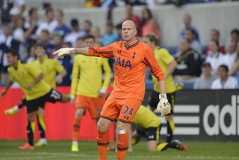 BRIDGEVIEW, IL - JULY 26:  Goalkeeper Brad Friedel #24 of Tottenham Hotspur signals to his teammates during the first half against the Chicago Fire at Toyota Park on July 26, 2014 in Bridgeview, Illinois. Tottenham Hotspur defeated the Fire 2-0.  (Photo b