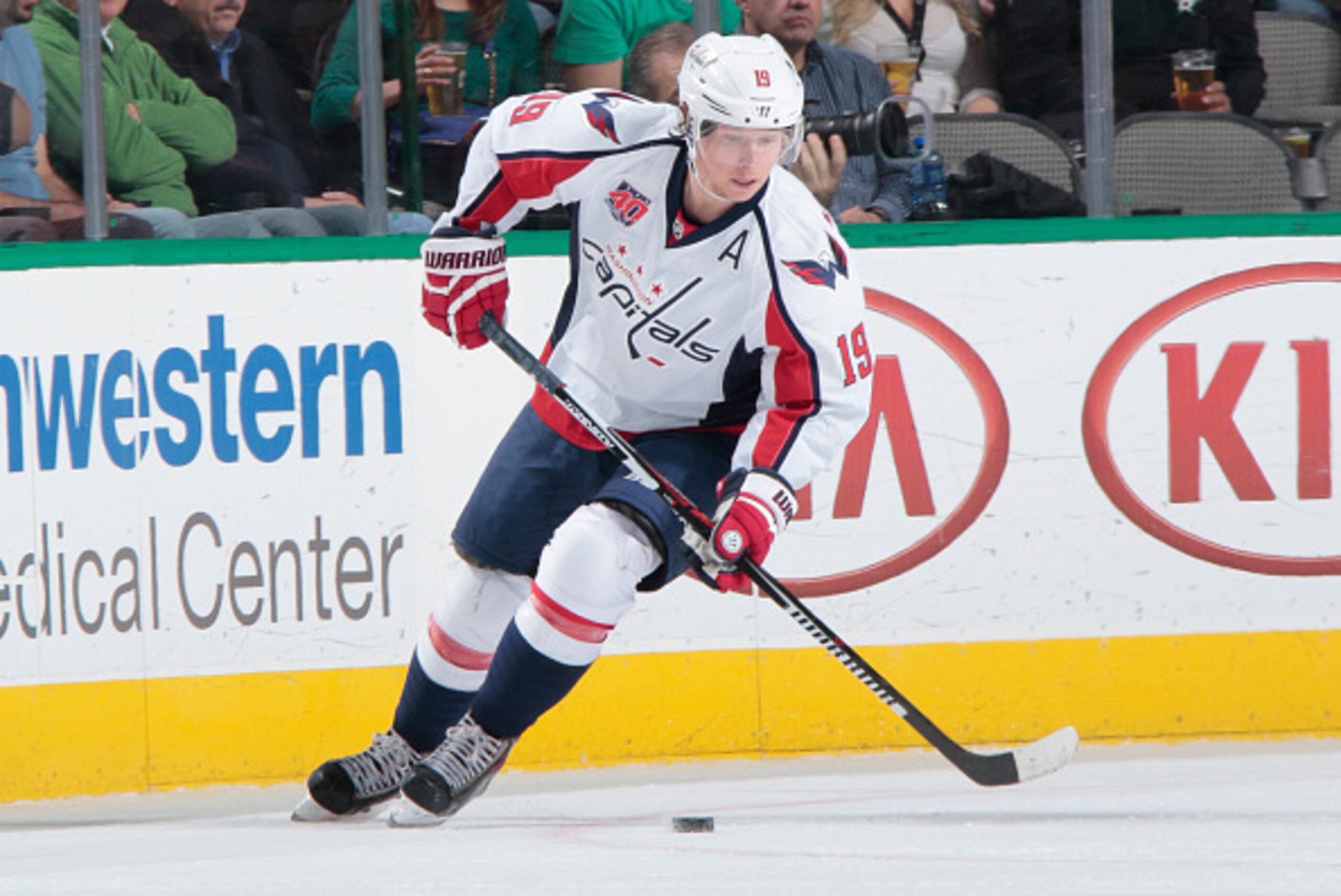 DALLAS, TX - JANUARY 17: Nicklas Backstrom #19 of the Washington Capitals handles the puck against the Dallas Stars at the American Airlines Center on January 17, 2015 in Dallas, Texas. (Photo by Glenn James/NHLI via Getty Images)
