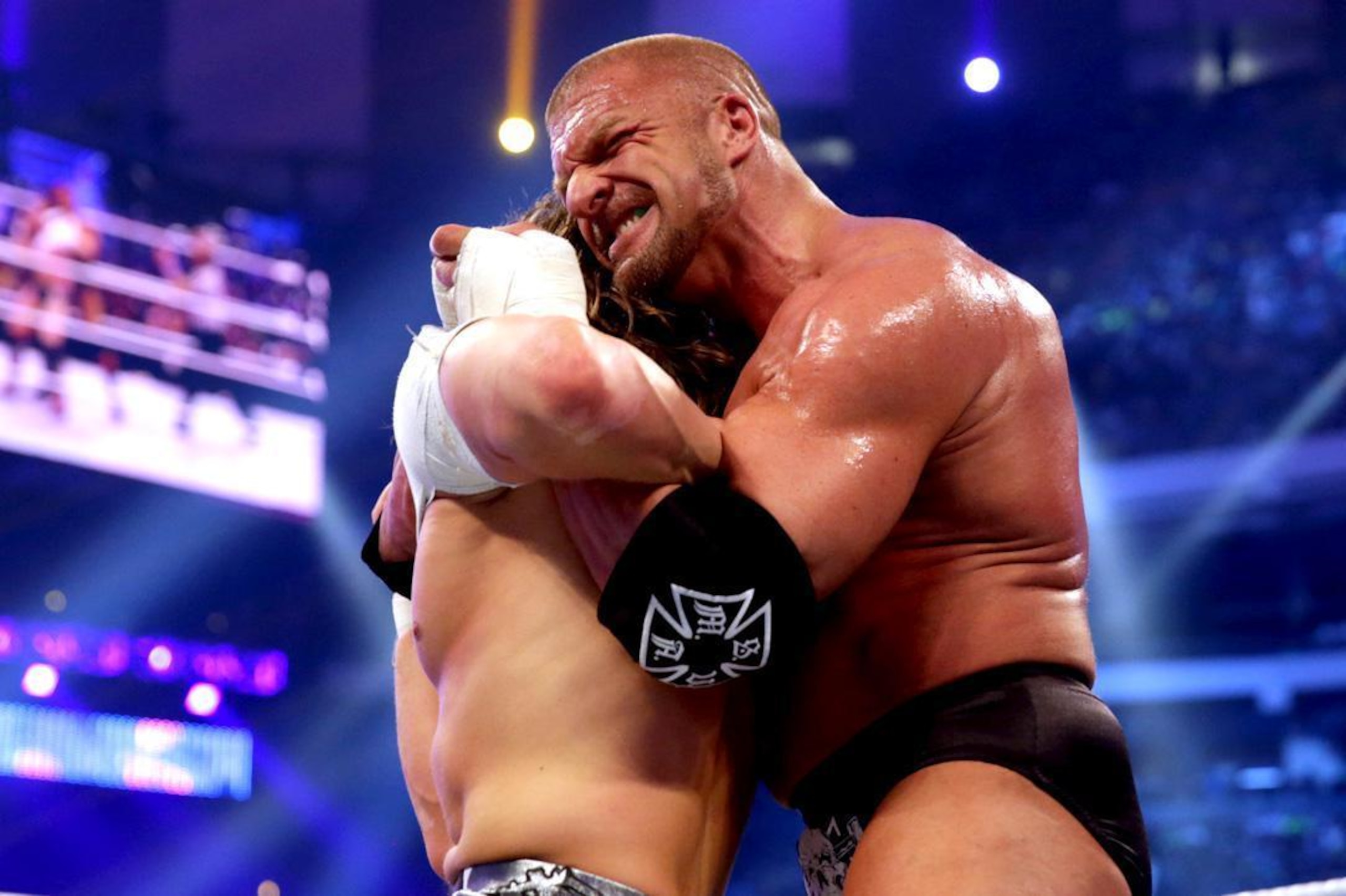 Triple H sets up the Tiger Suplex Triple H sets up the Tiger Suplex