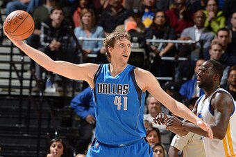 OAKLAND, CA - FEBRUARY 4: Dirk Nowitzki #41 of the Dallas Mavericks handles the basketball during a game against the Golden State Warriors at Oracle Arena on February 4, 2015 in Oakland, California. NOTE TO USER: User expressly acknowledges and agrees tha