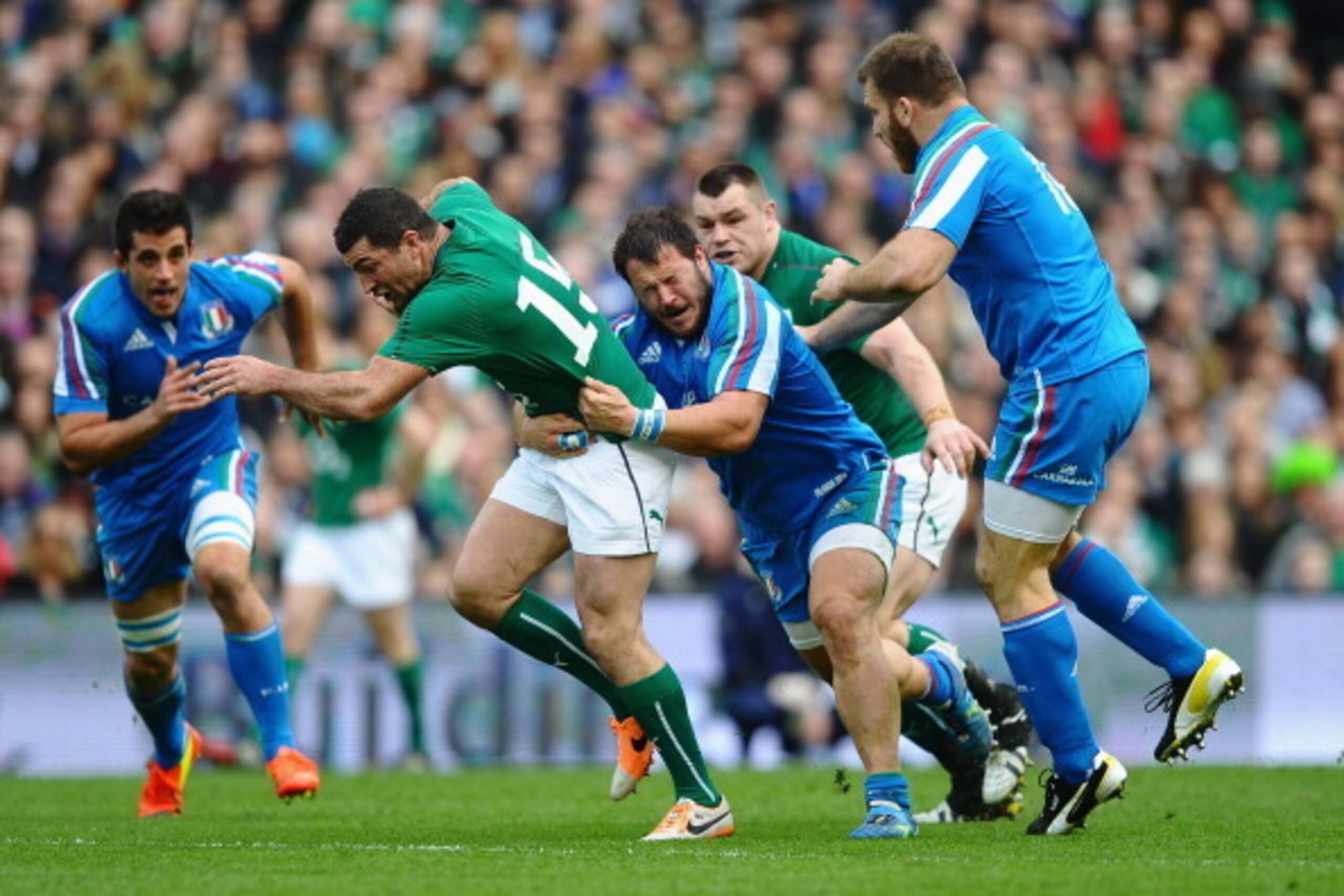 DUBLIN, IRELAND - MARCH 08: Rob Kearney of Ireland is tackled by Alberto De Marchi of Italyduring the RBS Six Nations match between Ireland and Italy at Aviva Stadium on March 8, 2014 in Dublin, Ireland.  (Photo by Laurence Griffiths/Getty Images)
