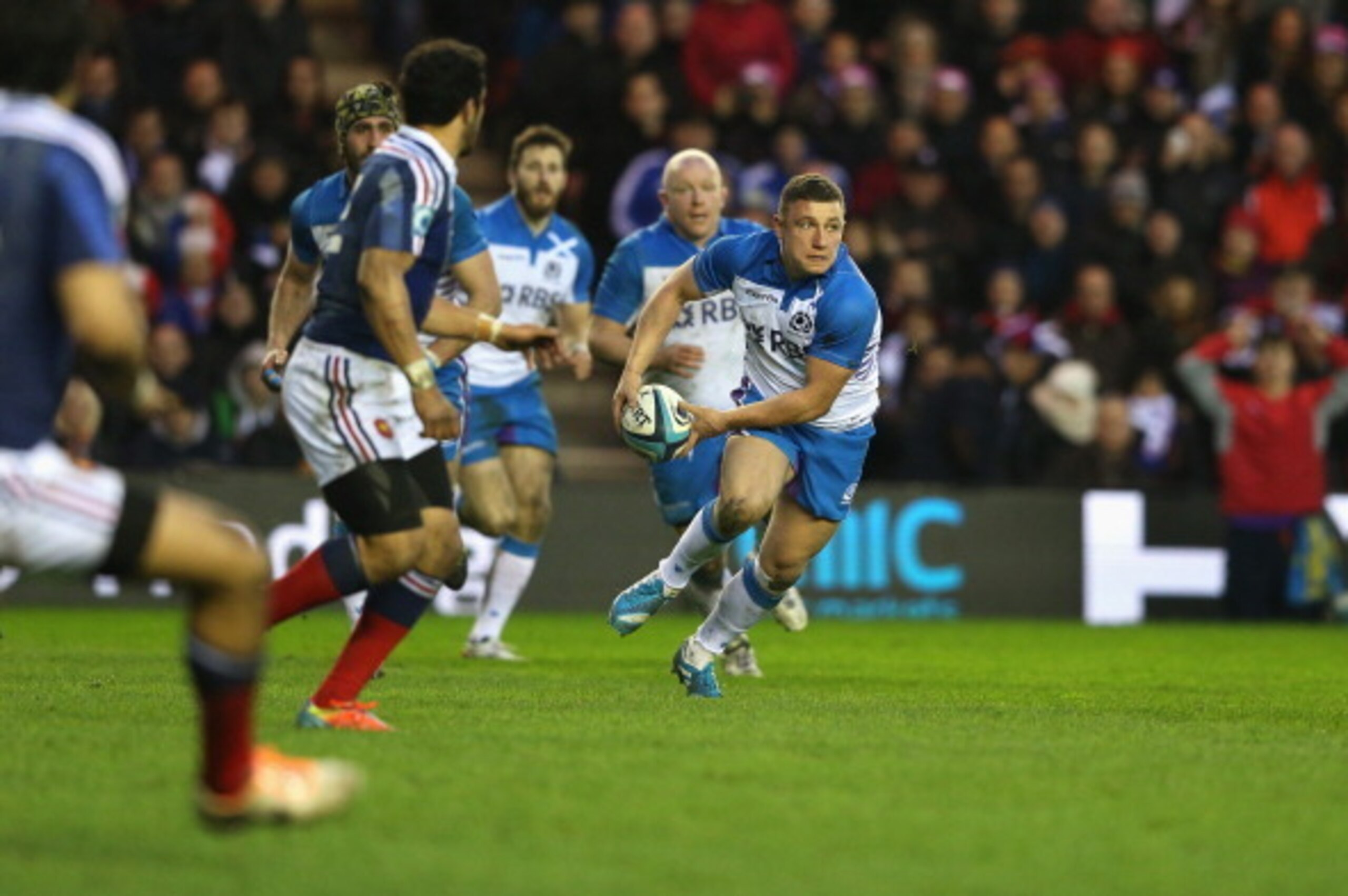 EDINBURGH, SCOTLAND - MARCH 08:  Duncan Weir of Scotland passes the ball which resulted in France wing Yoann Huget interception the pass and breaking away for a try during the RBS Six Nations match between Scotland and France at Murrayfield Stadium on Mar