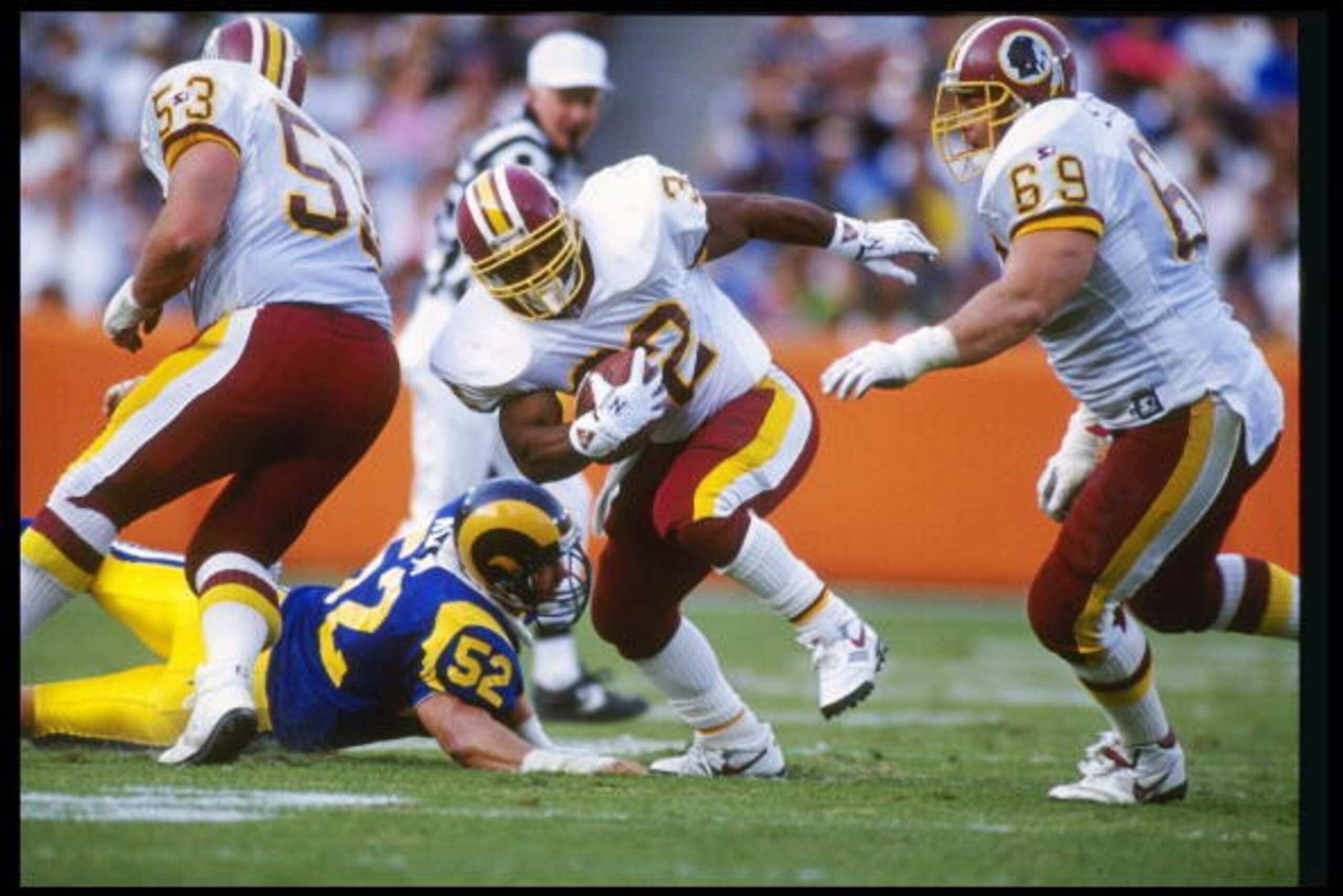 1 Dec 1991:  Running back Ricky Ervins of the Washington Redskins moves the ball during a game against the Los Angeles Rams at Anaheim Stadium in Anaheim, California.  The Redskins won the game, 27-6. Mandatory Credit: Stephen Dunn  /Allsport